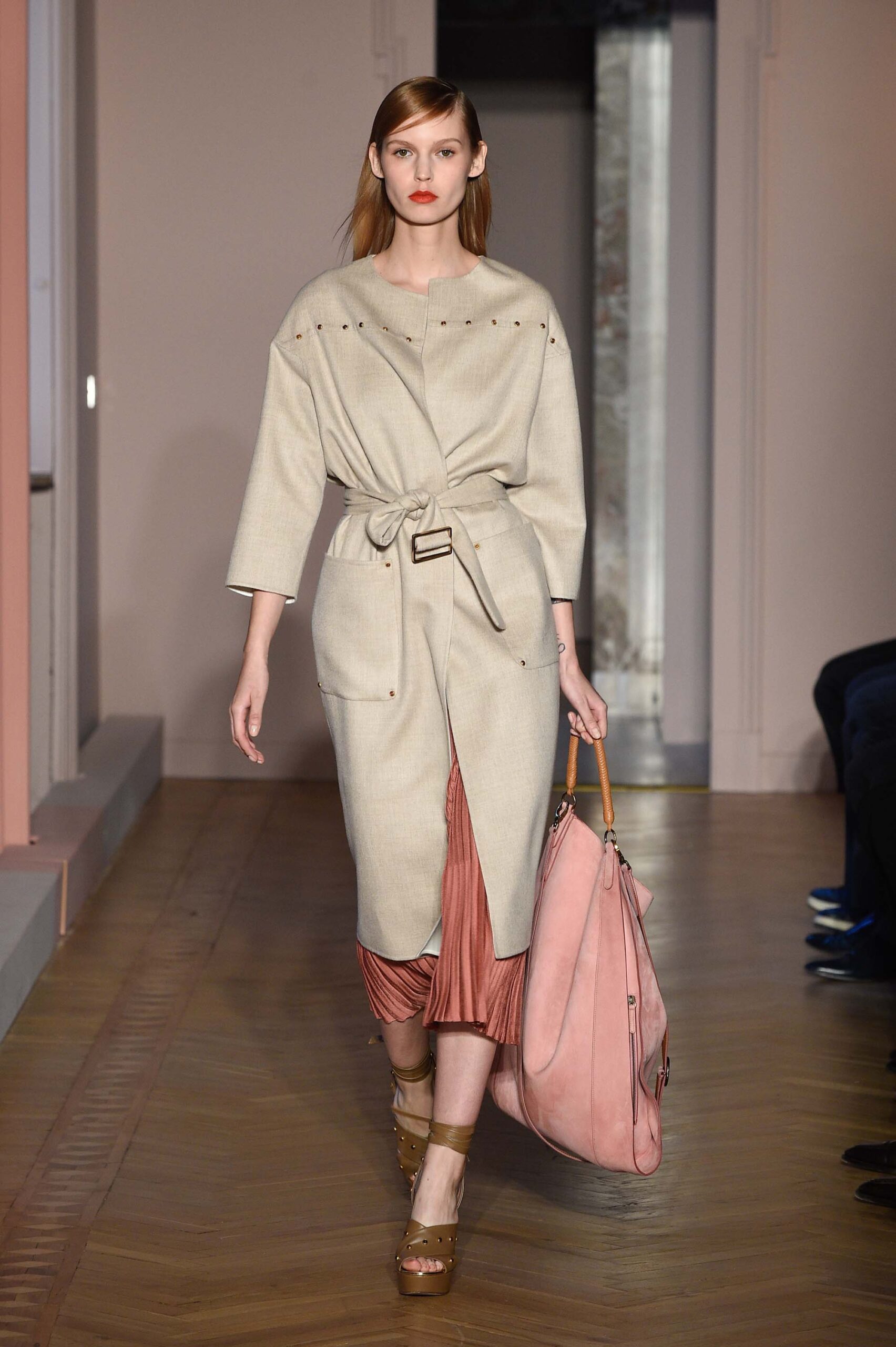 beige coat with pink dress