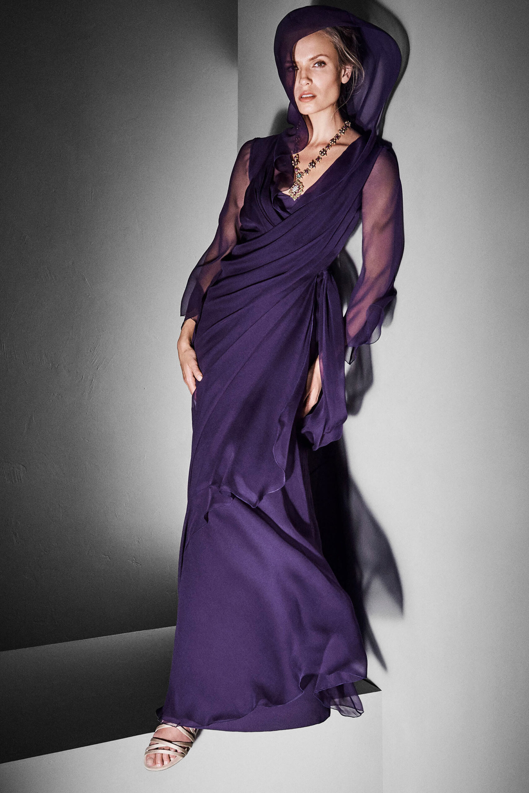 purple silk draped gown