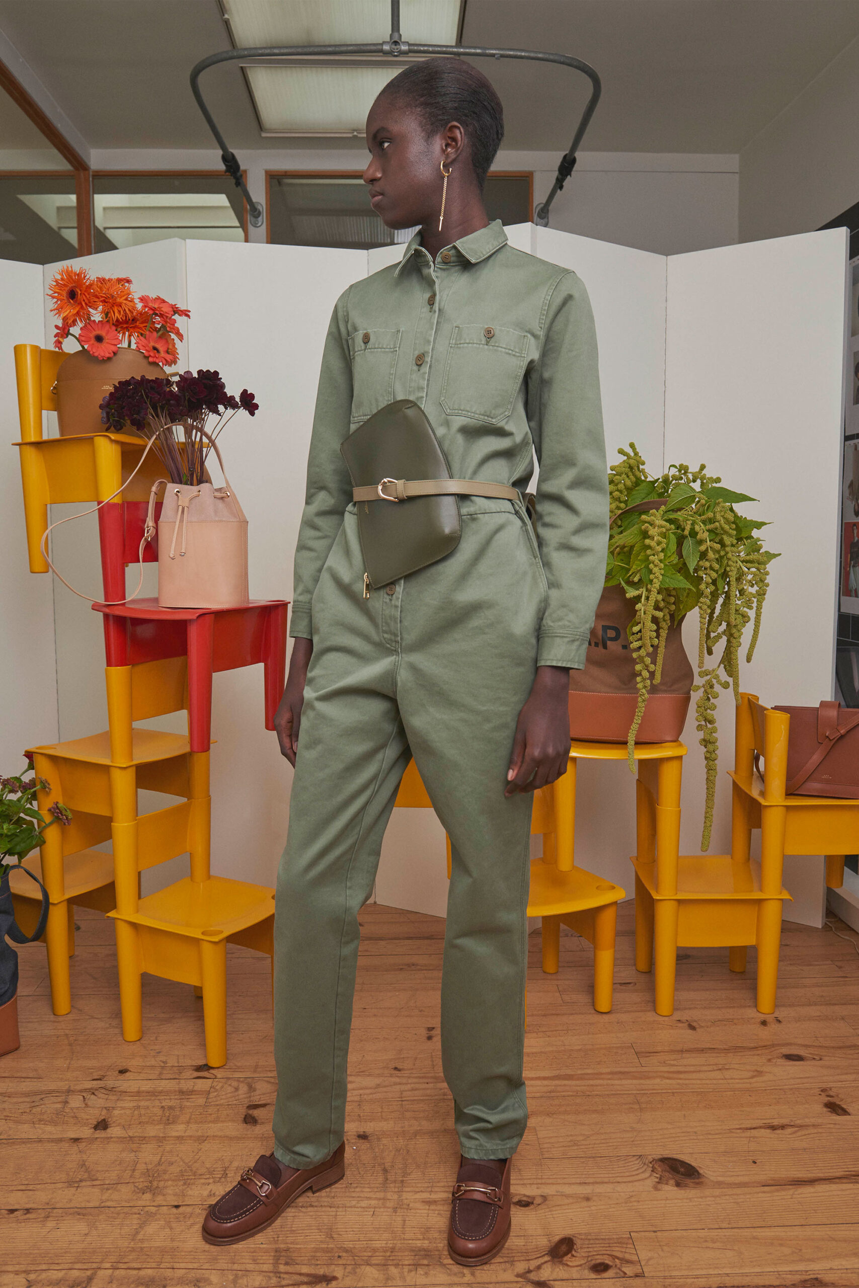green fitted jumpsuit with bag