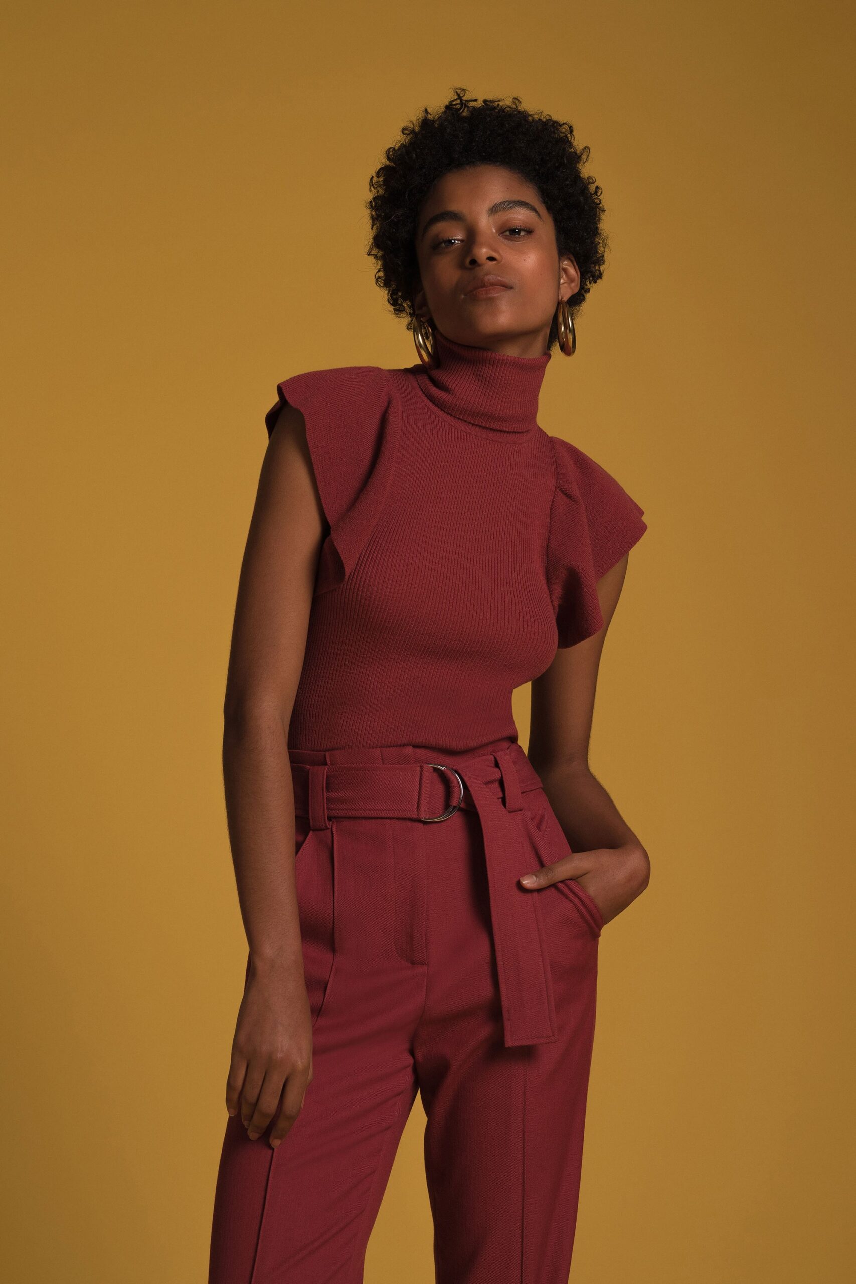 red cotton sleeveless high-neck fitted ruffled top