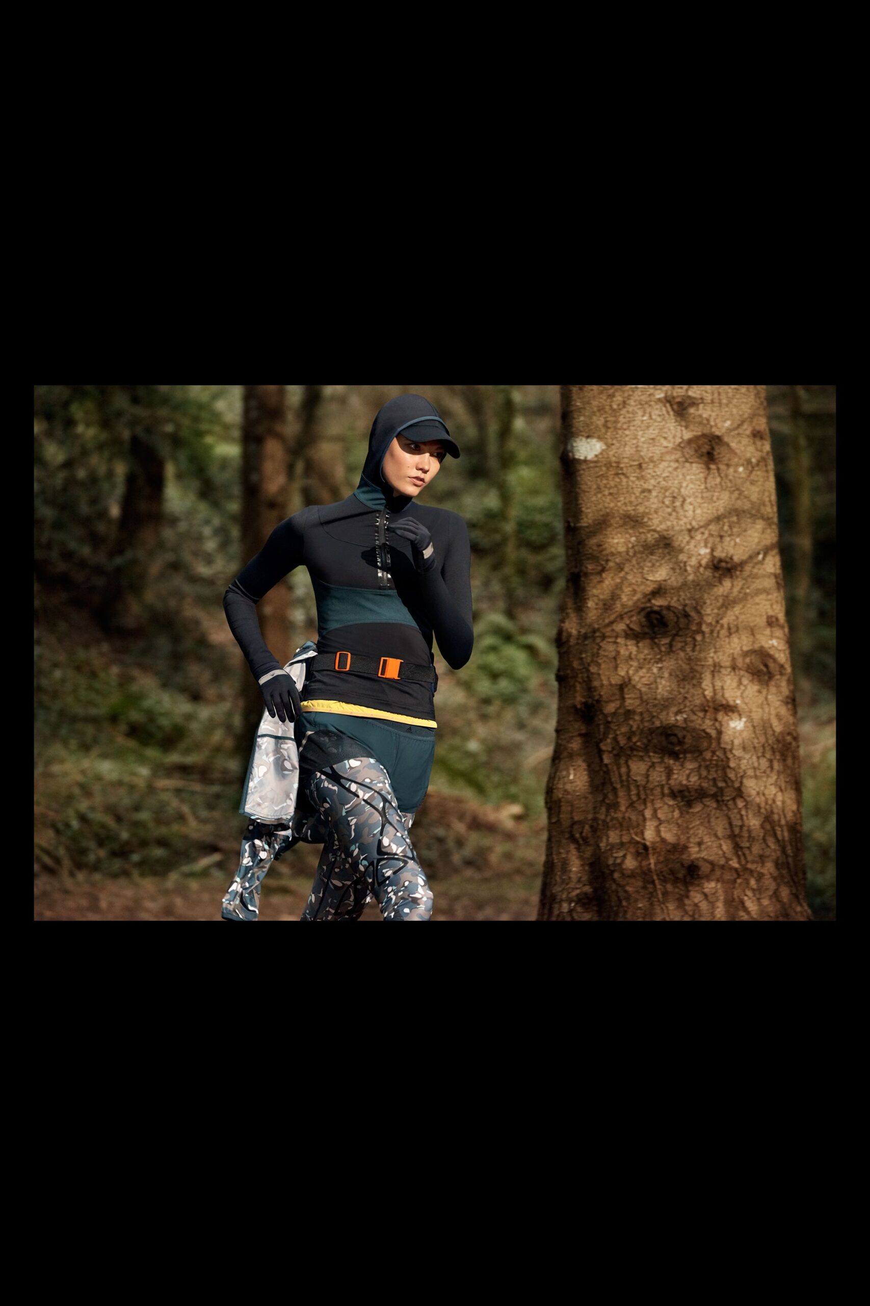 black neoprene fitted top with printed pants