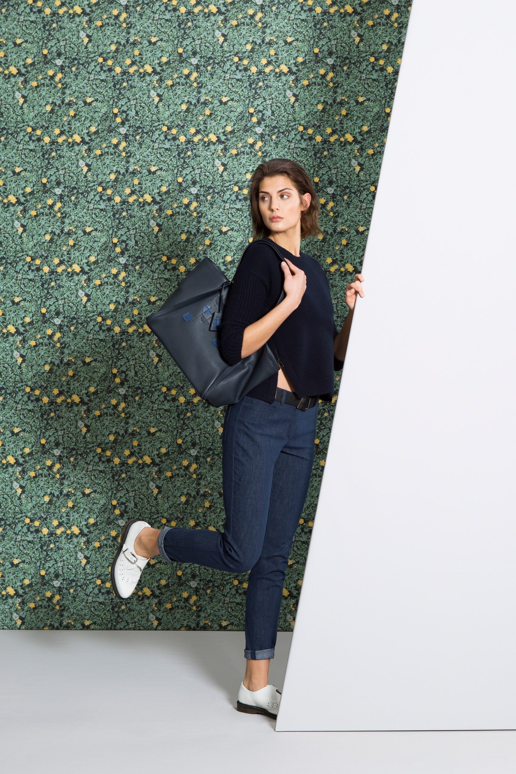 navy top with fitted jeans