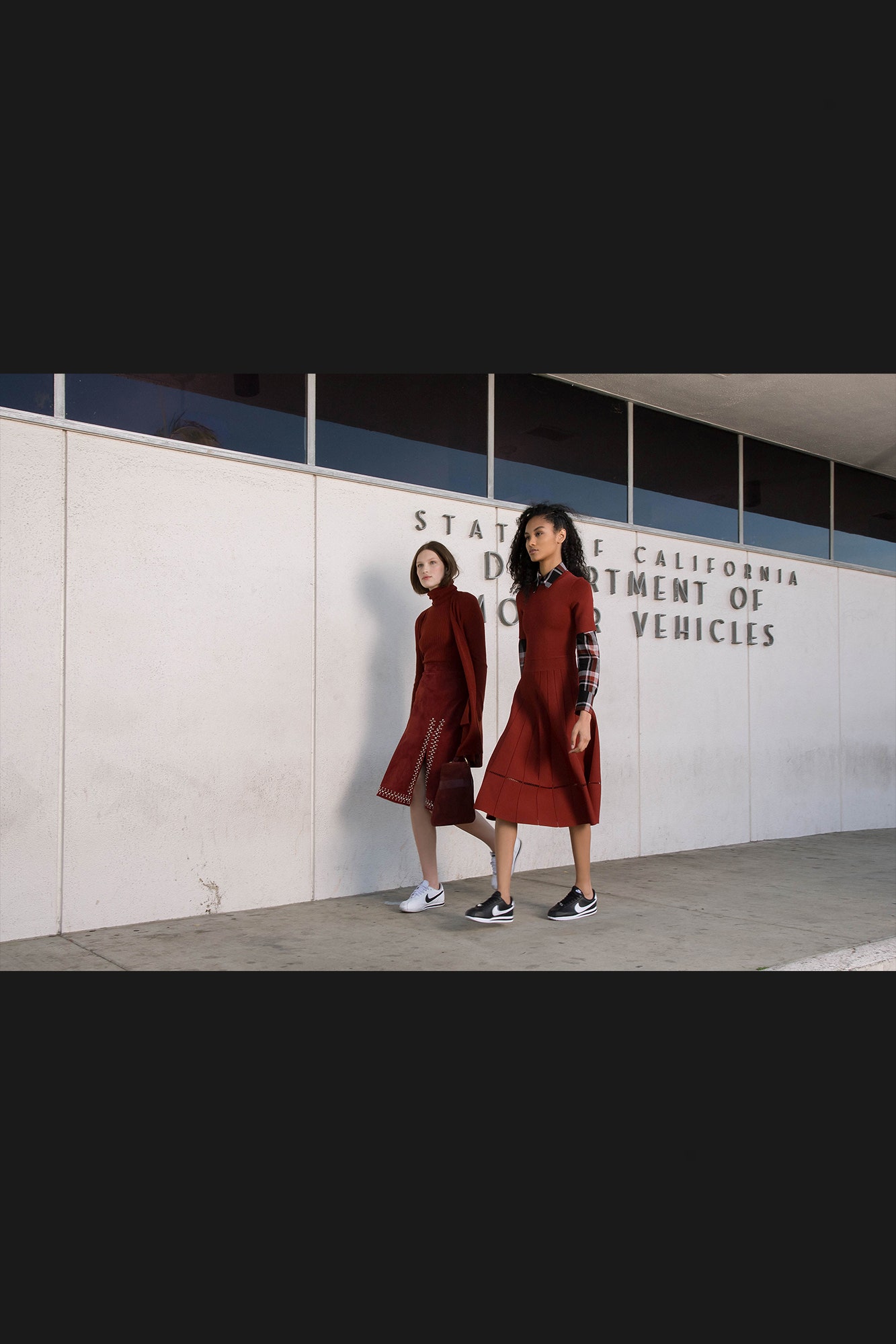 red leather long-sleeve high-neck fitted midi dress