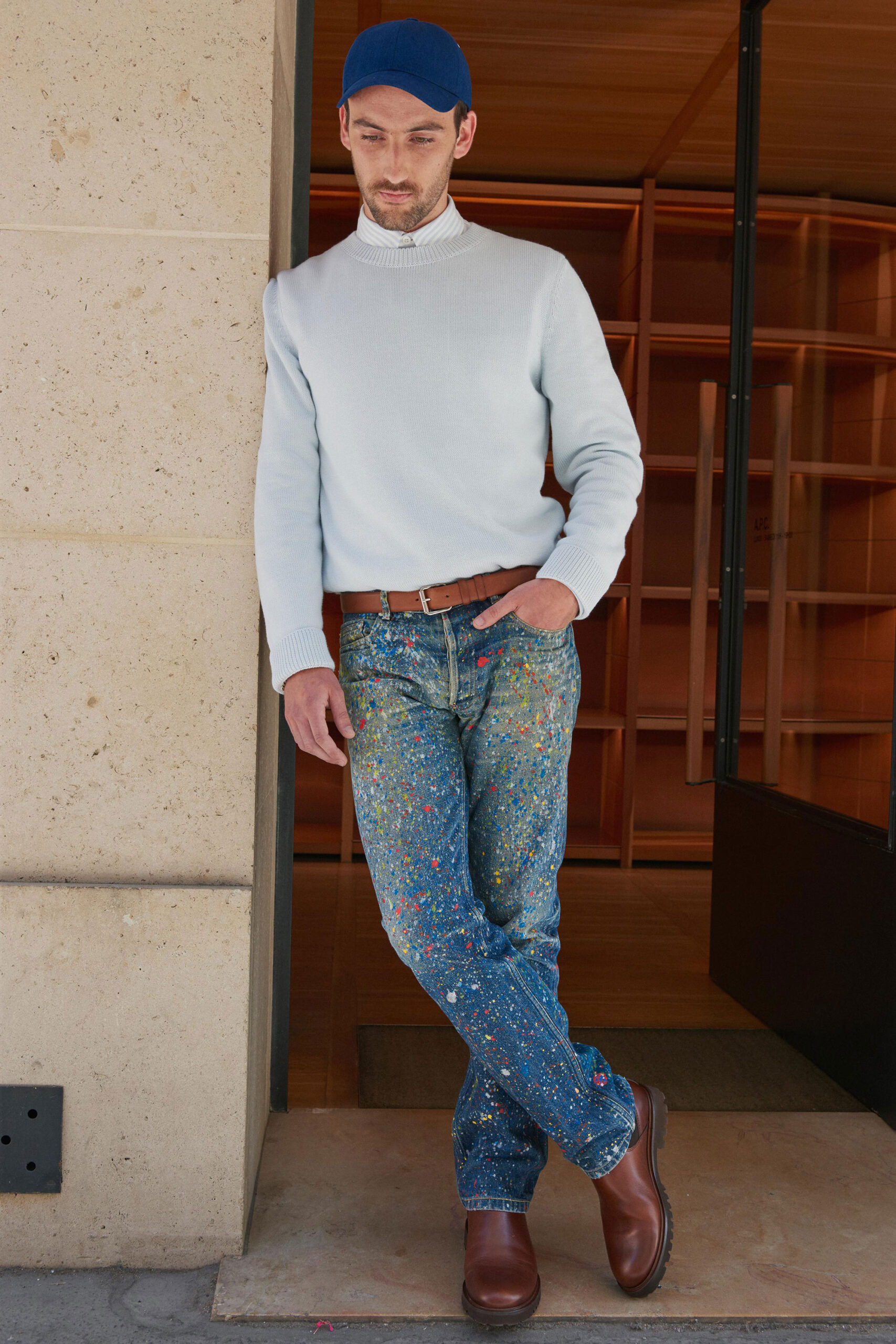 light blue fitted sweater with distressed jeans