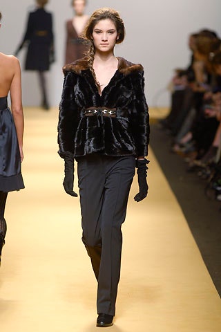 black faux-fur jacket and pants