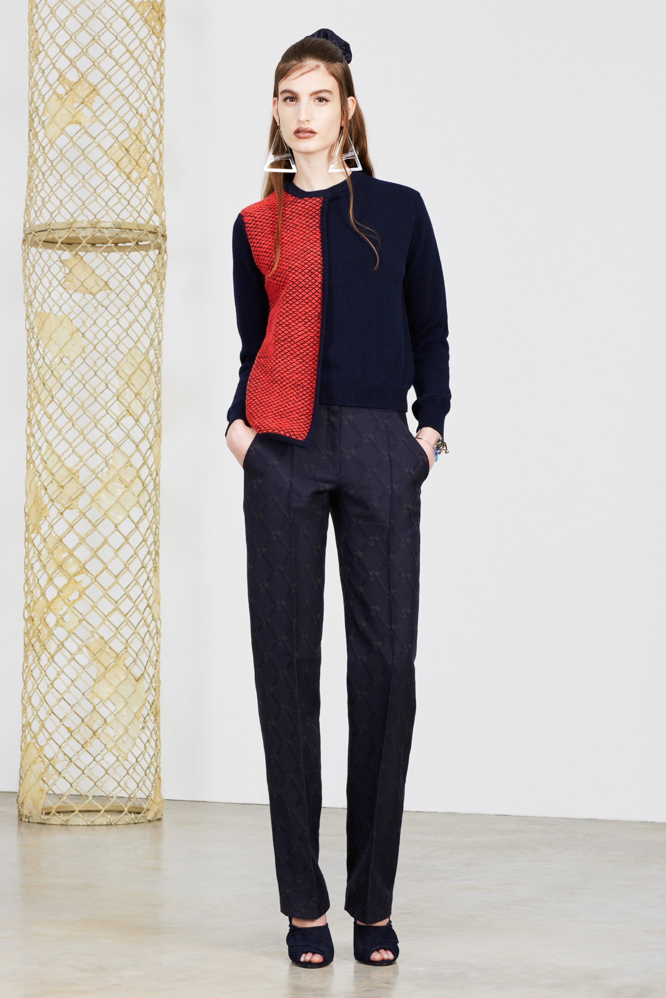 navy red color-blocked sweater with tailored pants
