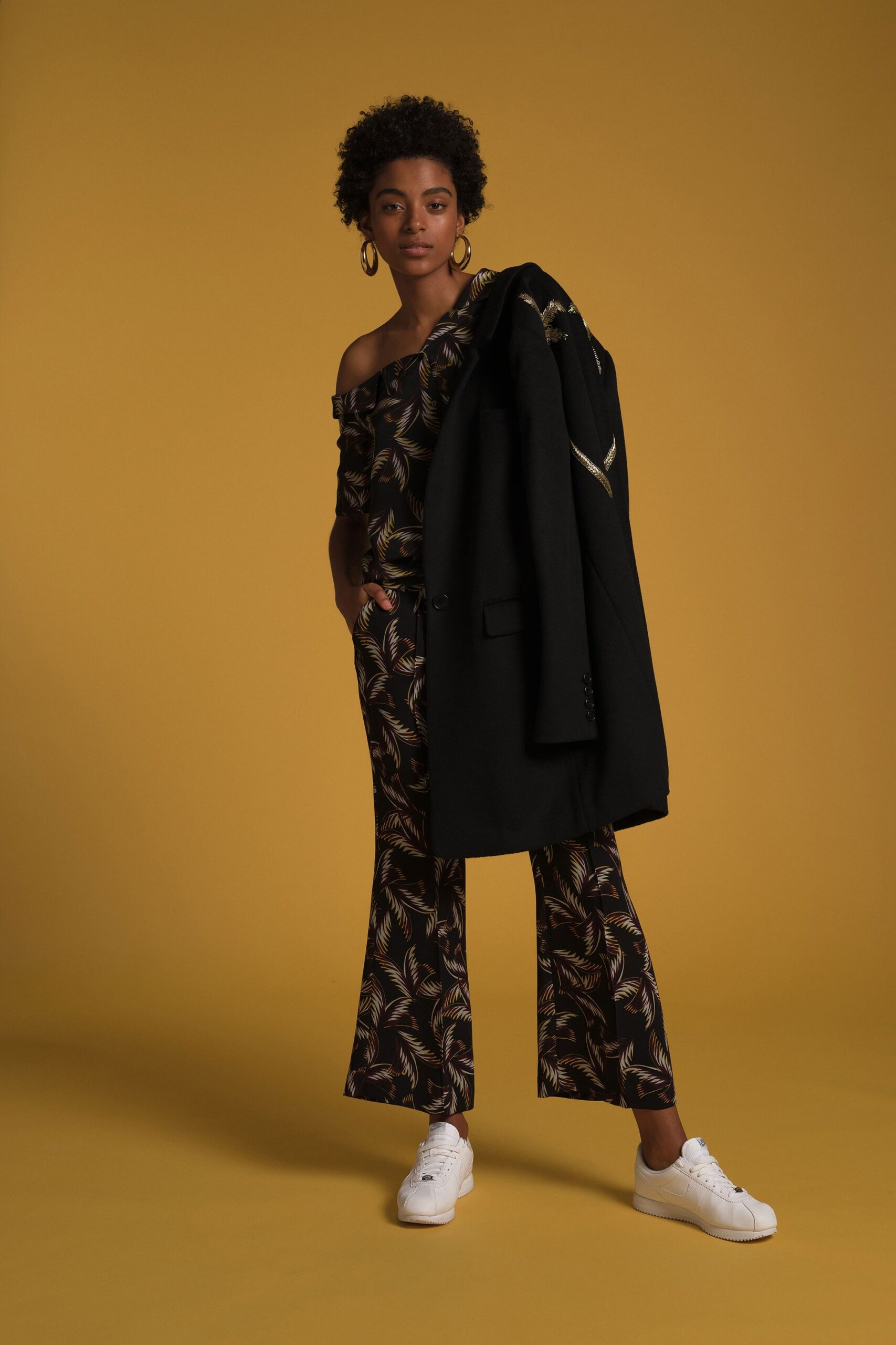 black off-shoulder fitted flared jumpsuit