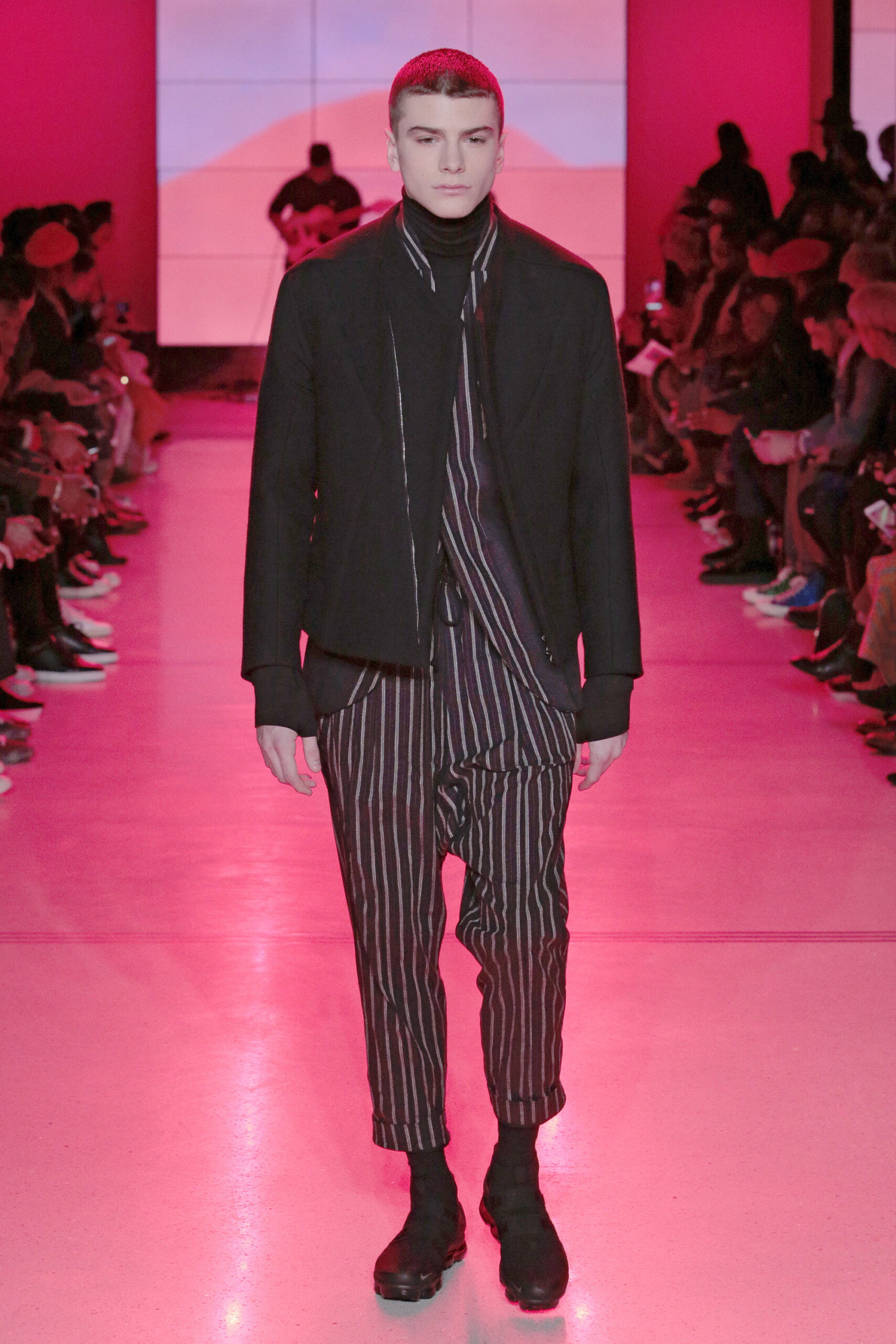black fitted jacket and relaxed pants
