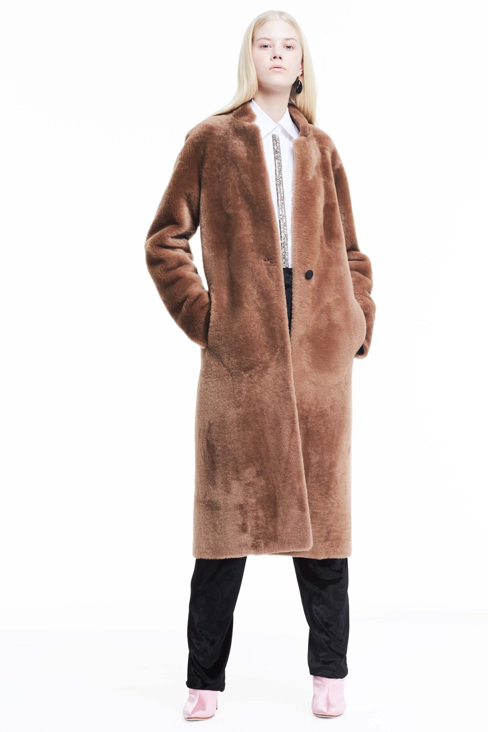 brown faux-fur coat with tailored pants