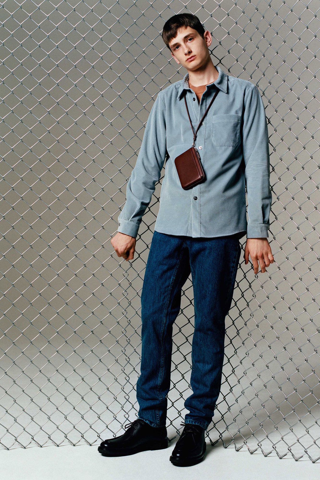 blue cotton shirt with denim pants