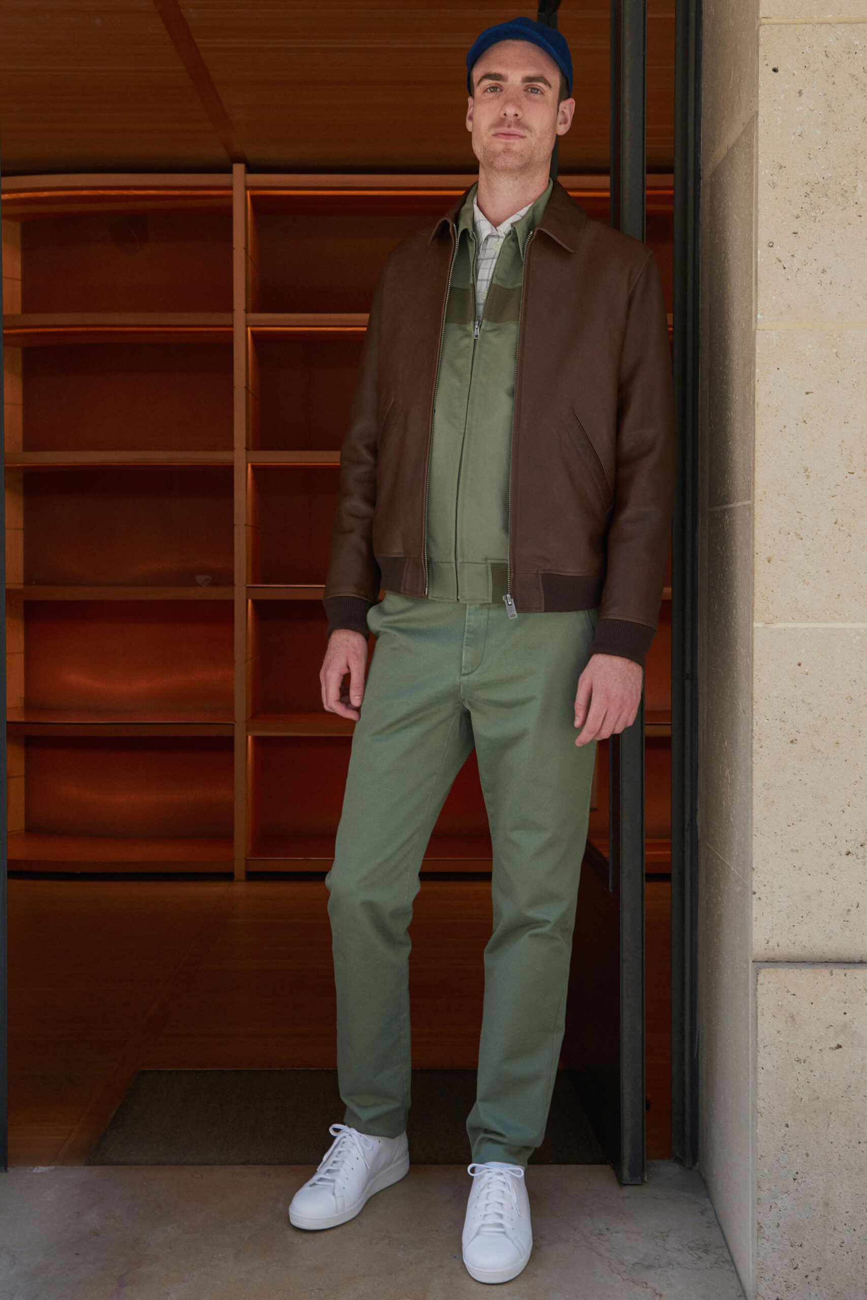 brown leather jacket with green shirt