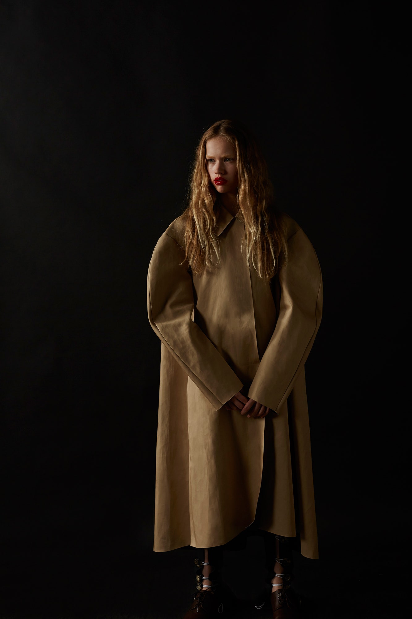 beige oversized vinyl coat