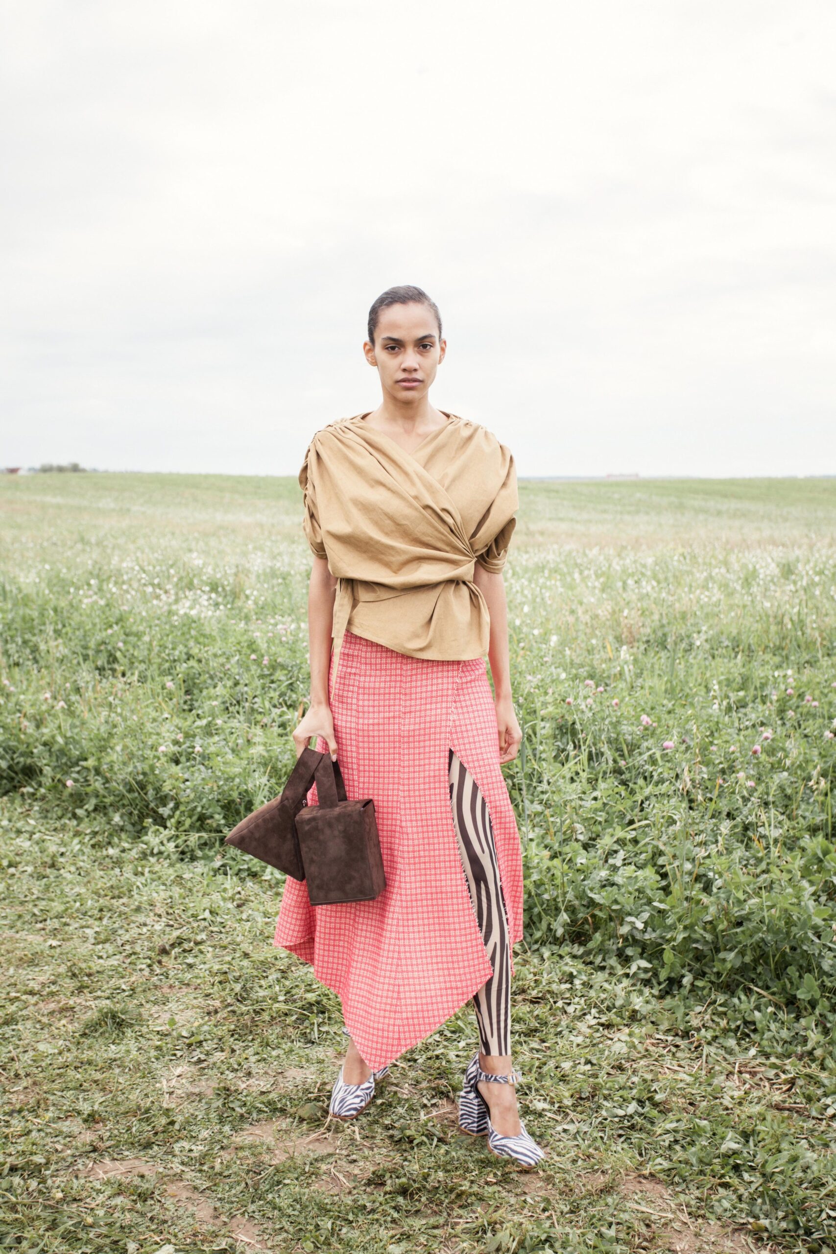 beige top with pink asymmetric skirt