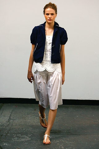white cotton sleeveless high-neck fitted embroidered top