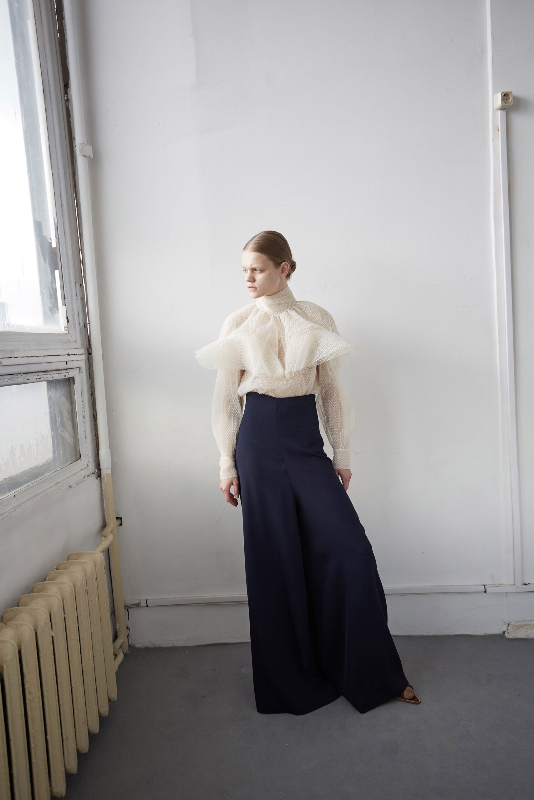 white silk long-sleeve high-neck fitted ruffled blouse