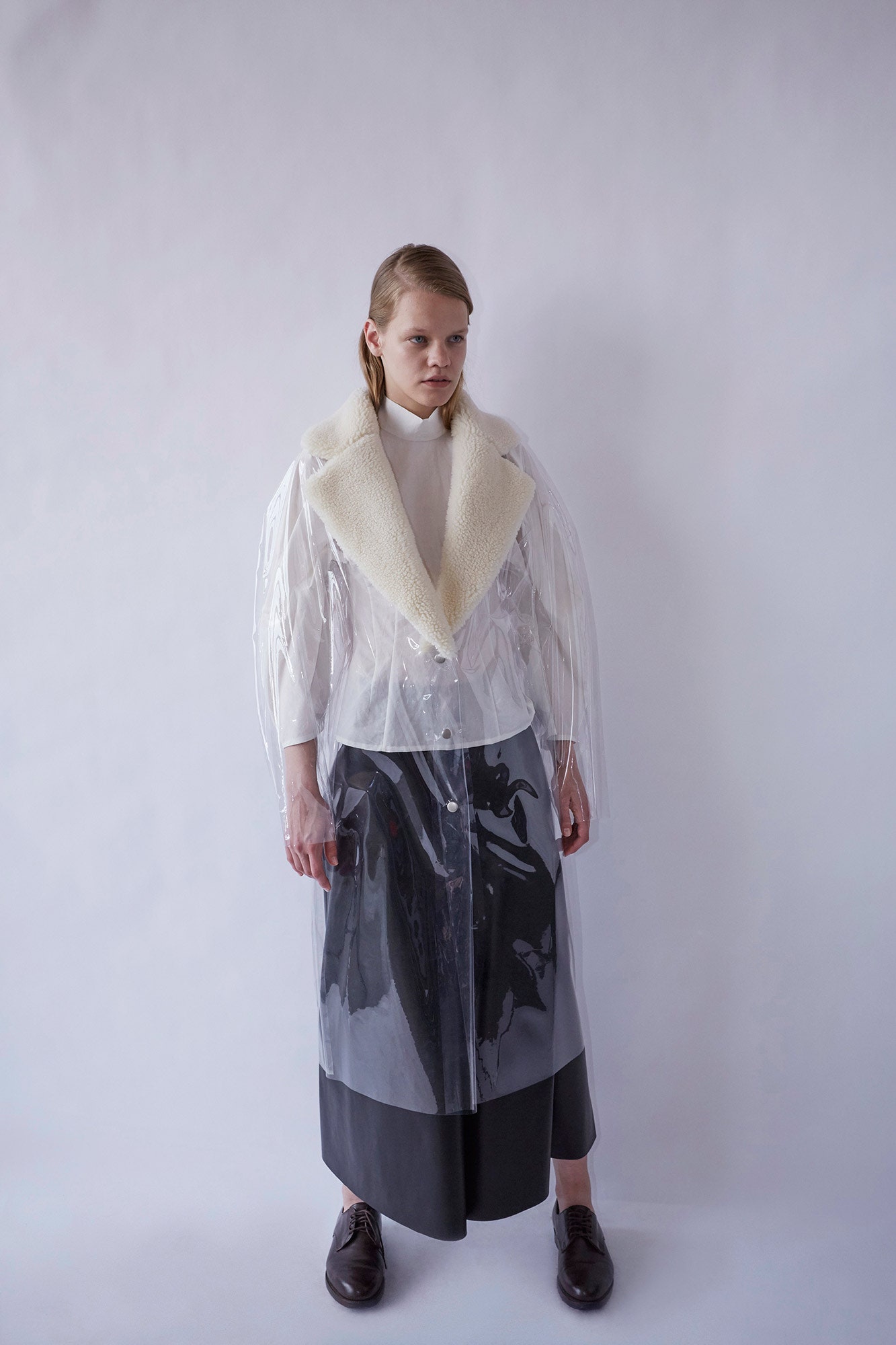 clear vinyl long-sleeve collared relaxed buttoned shiny jacket