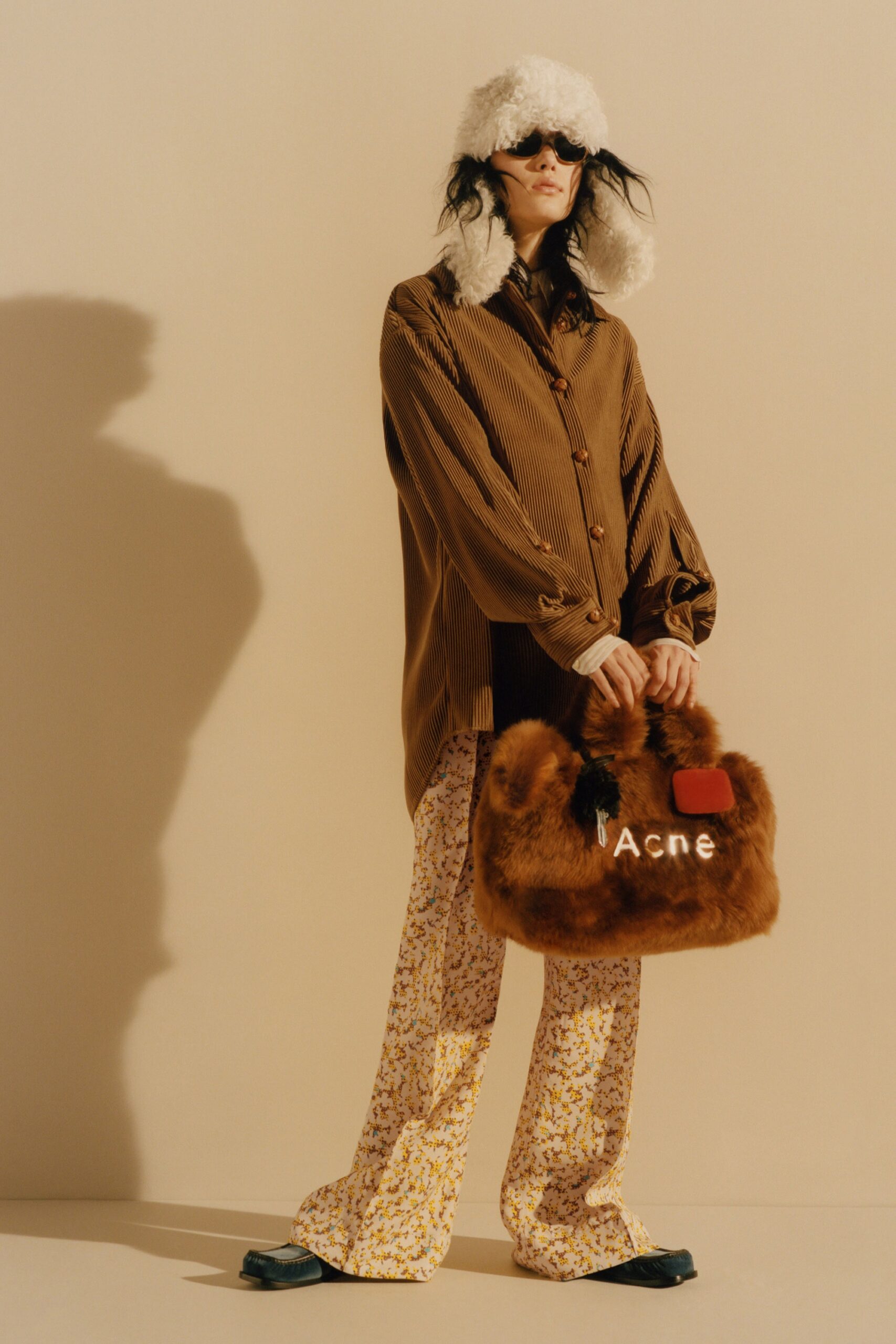 brown relaxed shirt with flared pants