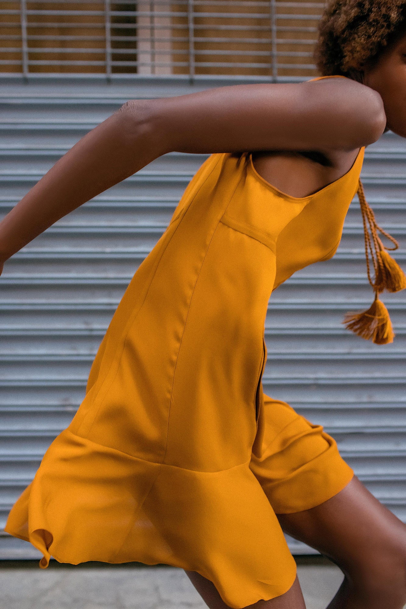 fitted orange sleeveless dress