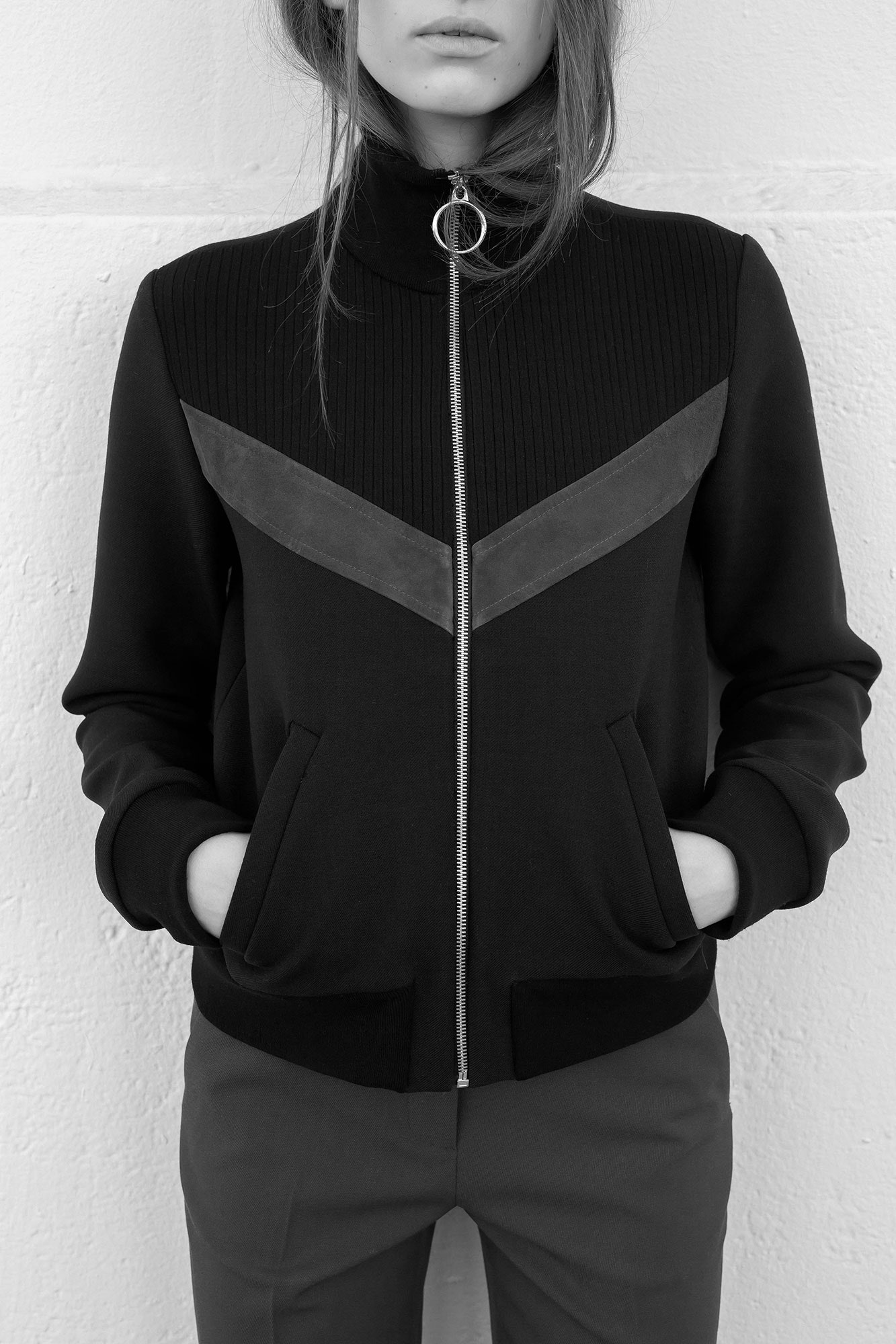 black fitted jacket and tailored pants