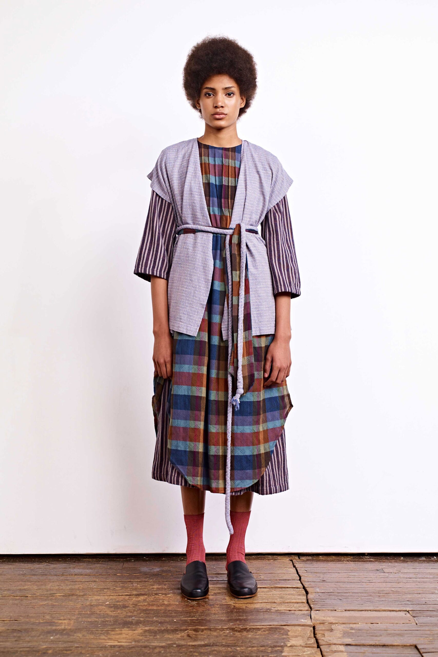 multi-colored midi dress with gray vest
