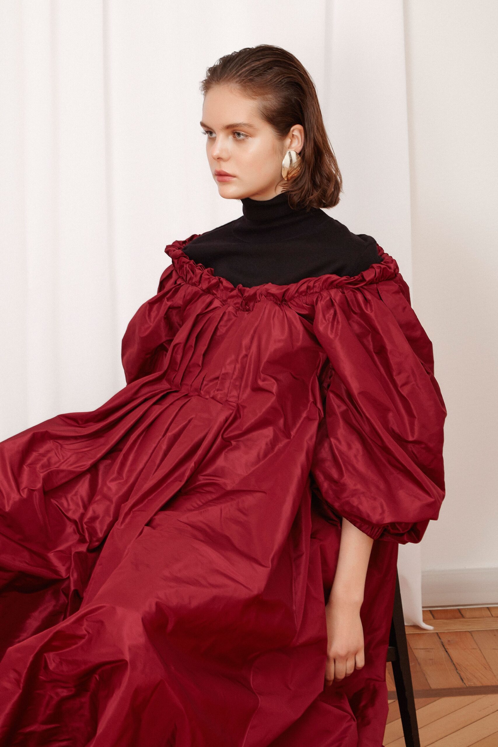 red pleated maxi dress with black top