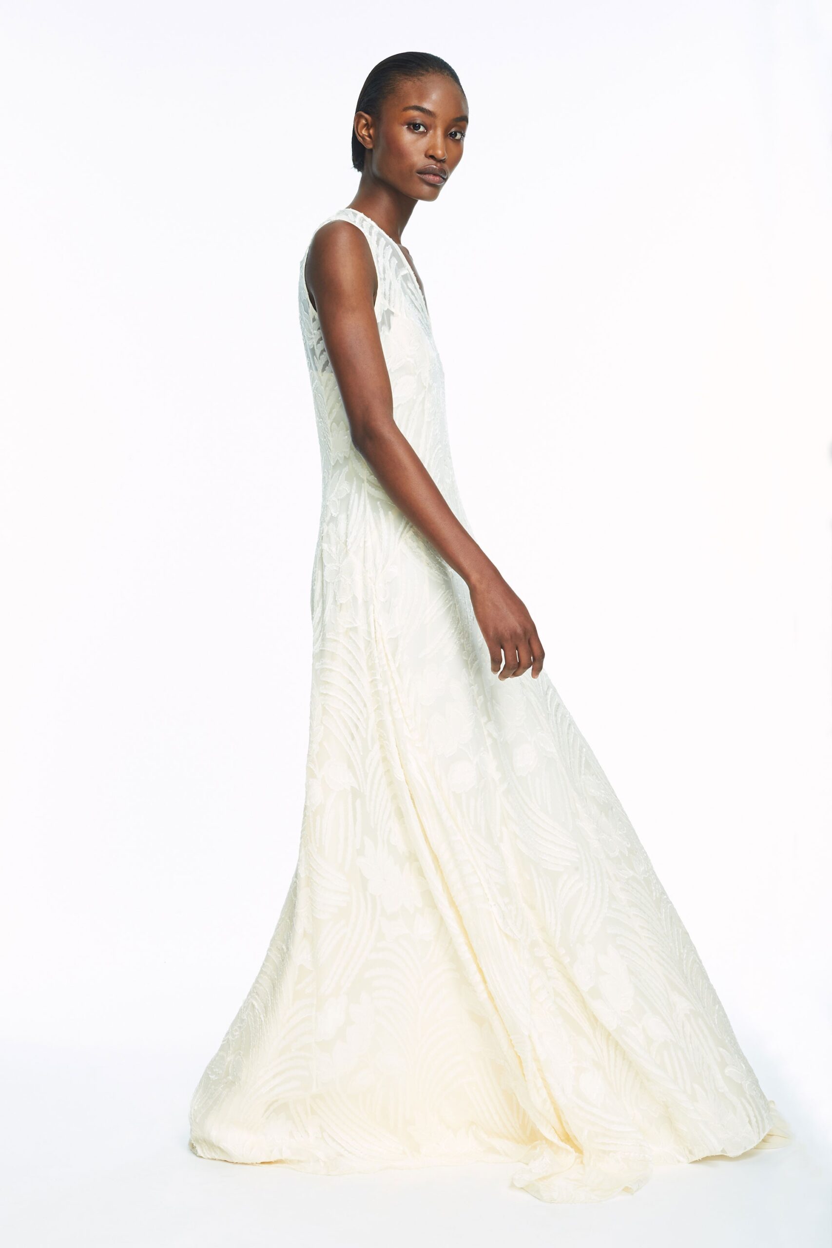 white silk embroidered gown