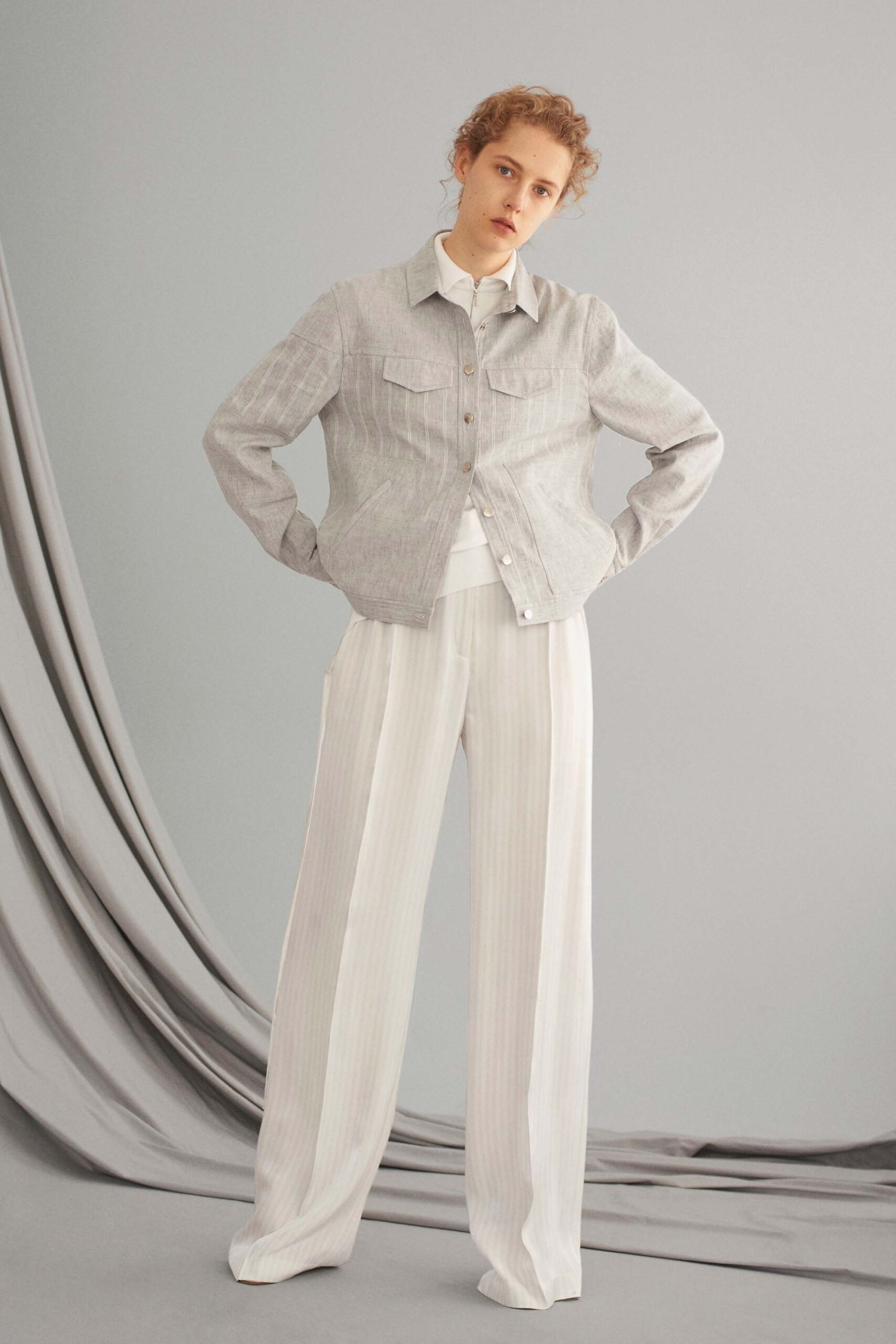gray relaxed jacket with white pants