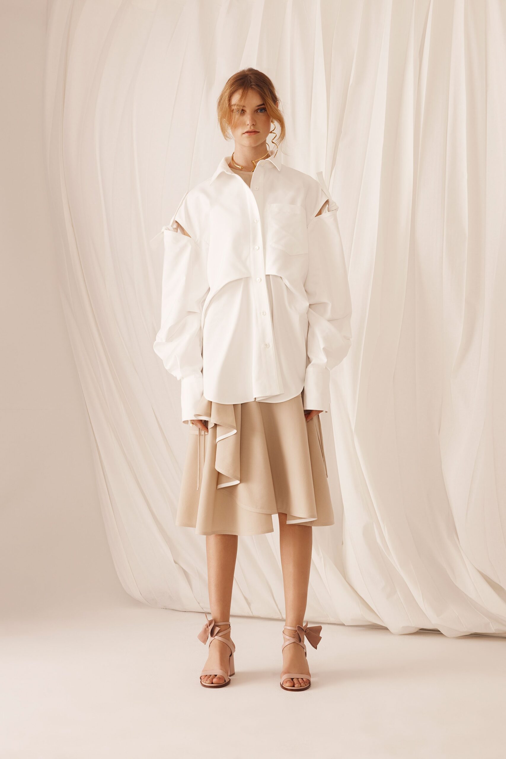beige cotton asymmetric fitted pleated midi skirt
