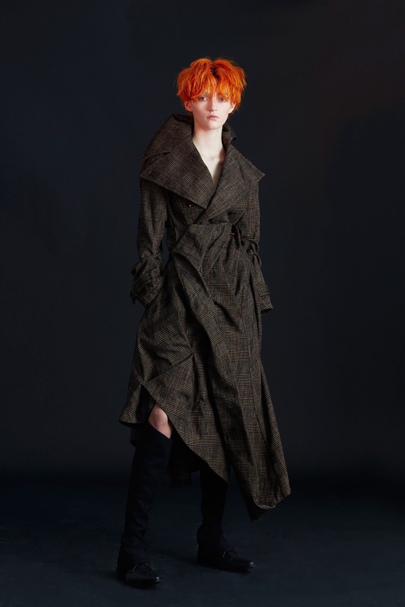 brown and black belted trench coat