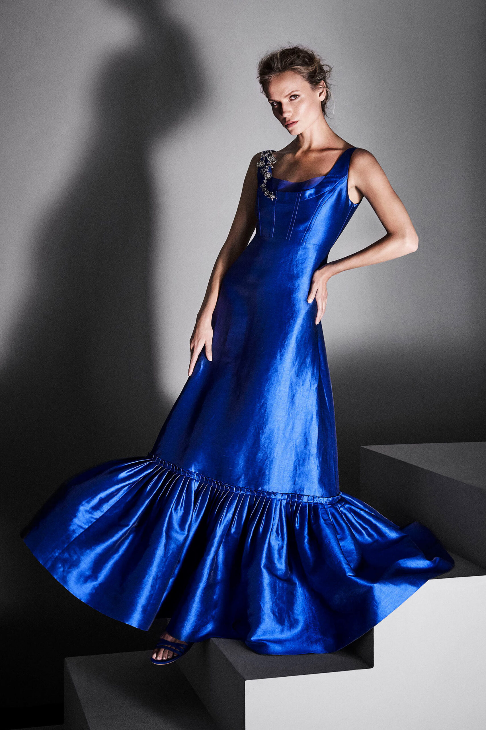 blue silk sleeveless gown