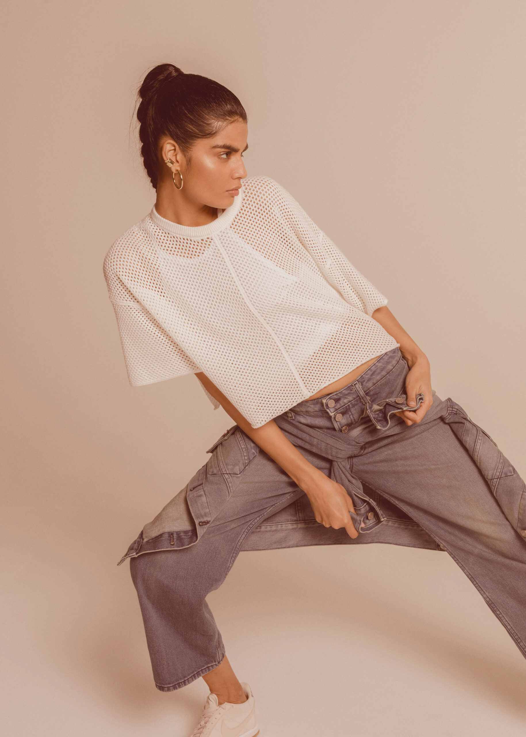 white mesh top and blue cargo pants