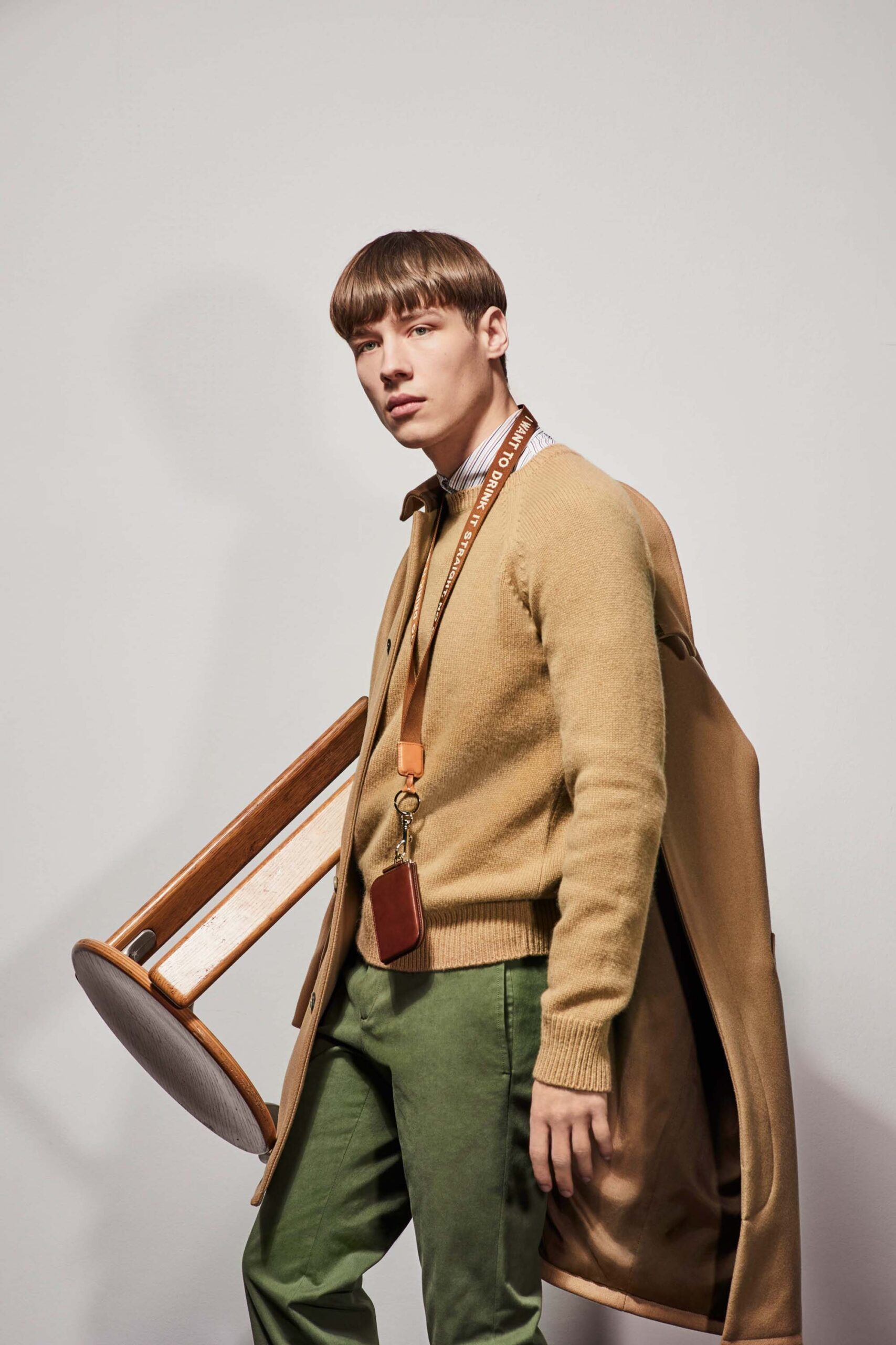 beige wool coat with tan sweater