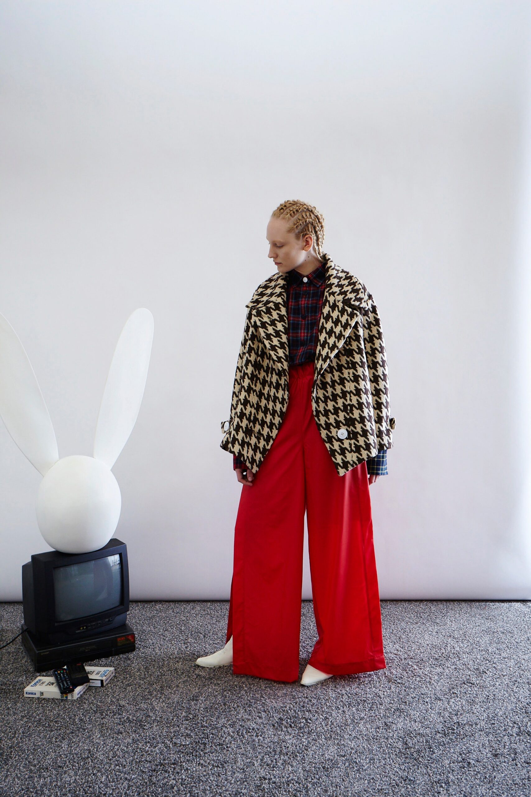 oversized checked jacket and relaxed red pants