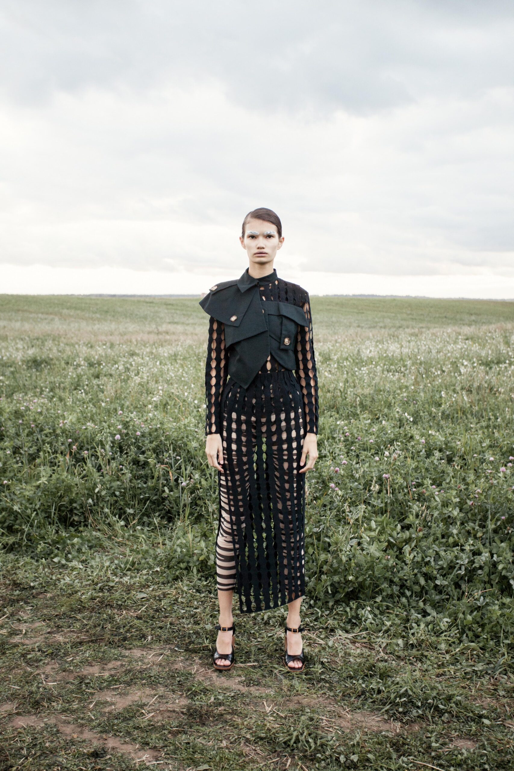 black fitted top and midi skirt