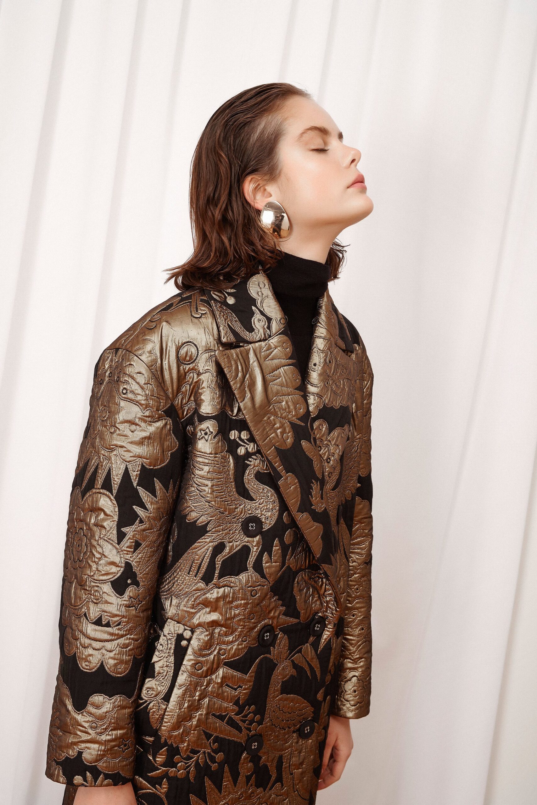 black silk embroidered blazer and fitted turtleneck