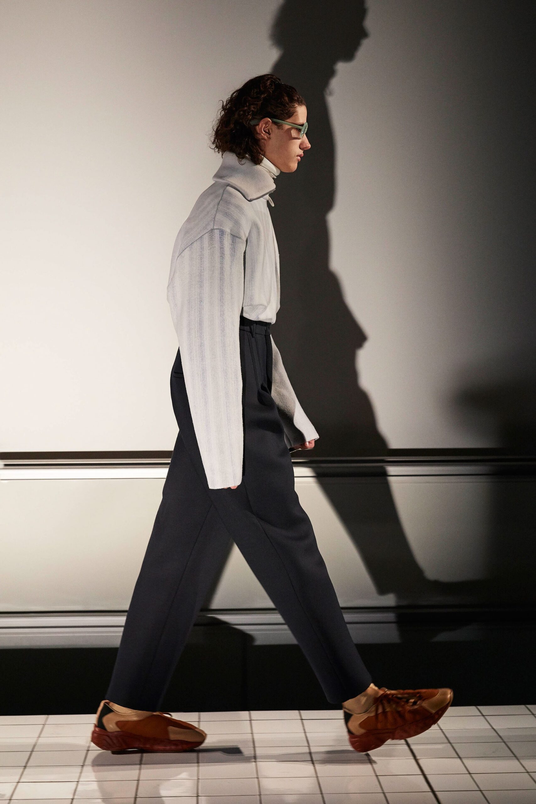 gray relaxed top with tailored pants