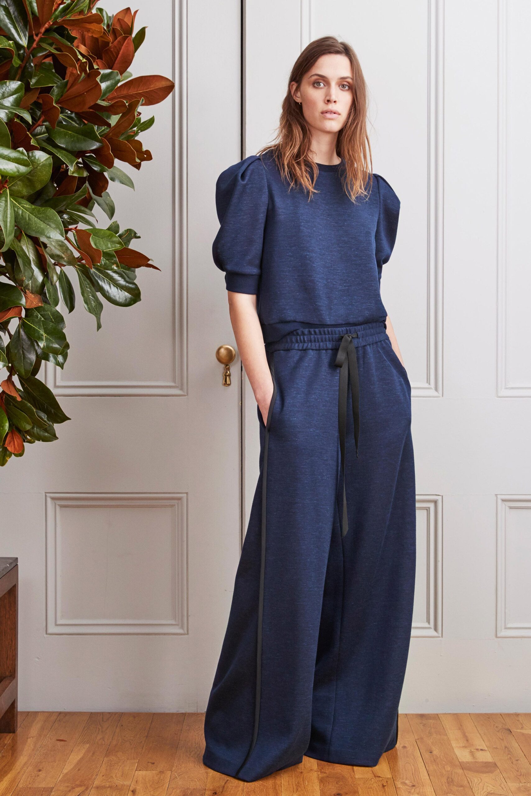 blue cotton short-sleeve collared relaxed padded top