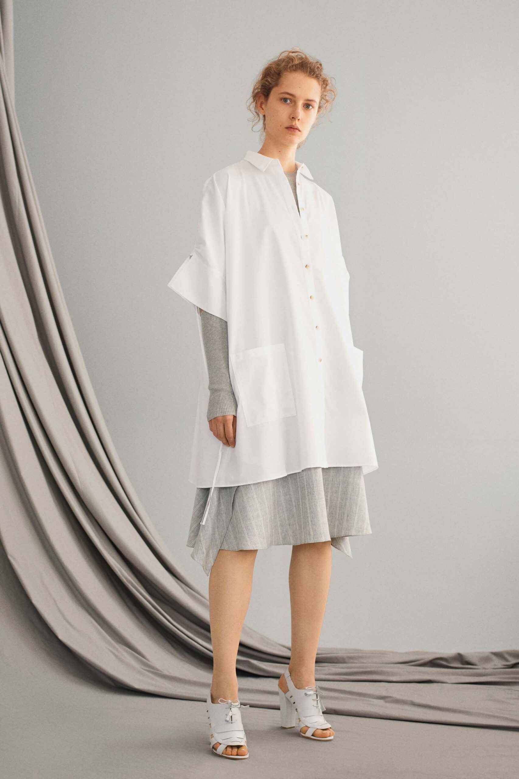 white shirt-dress with gray pleated dress