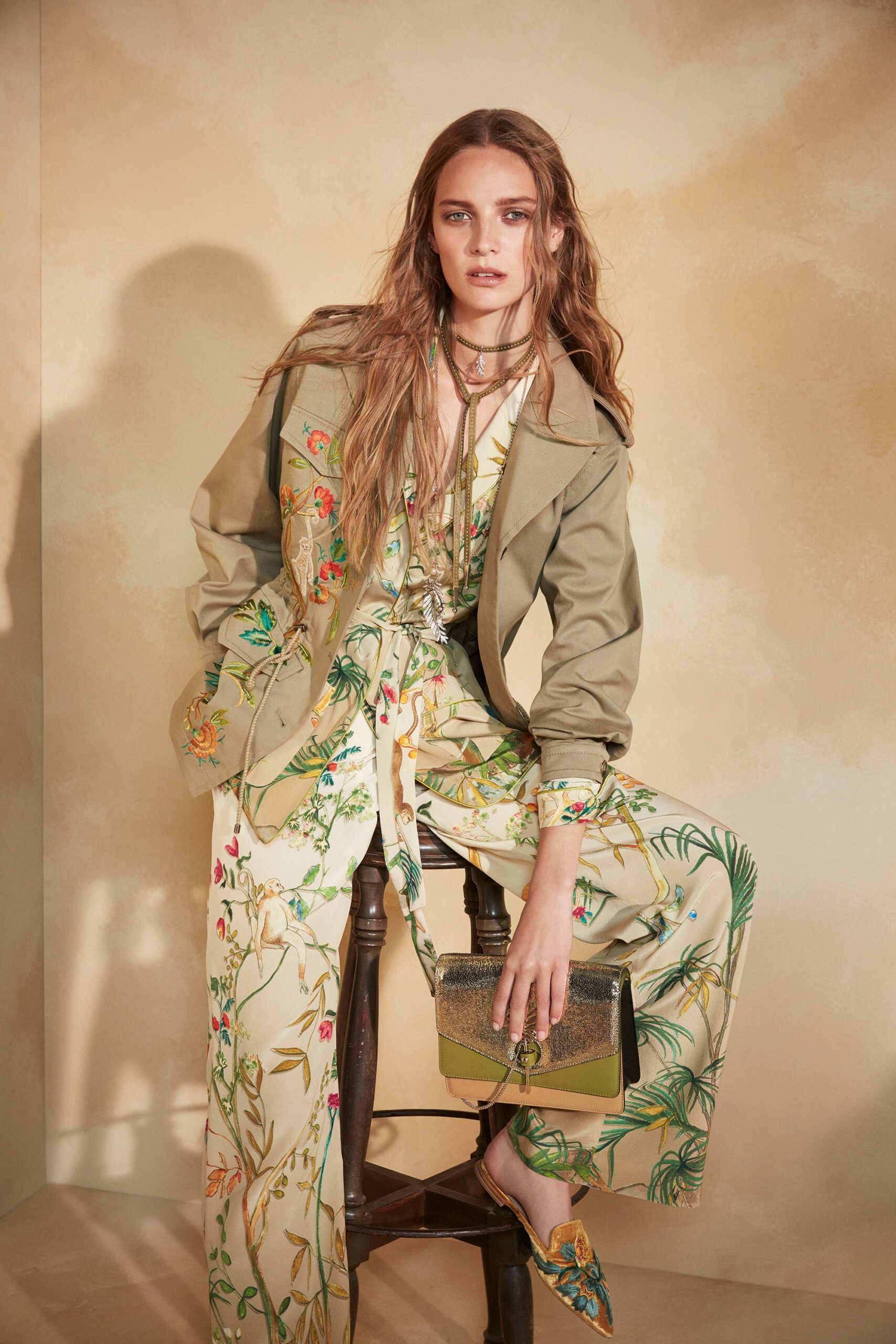 green jacket and yellow jumpsuit