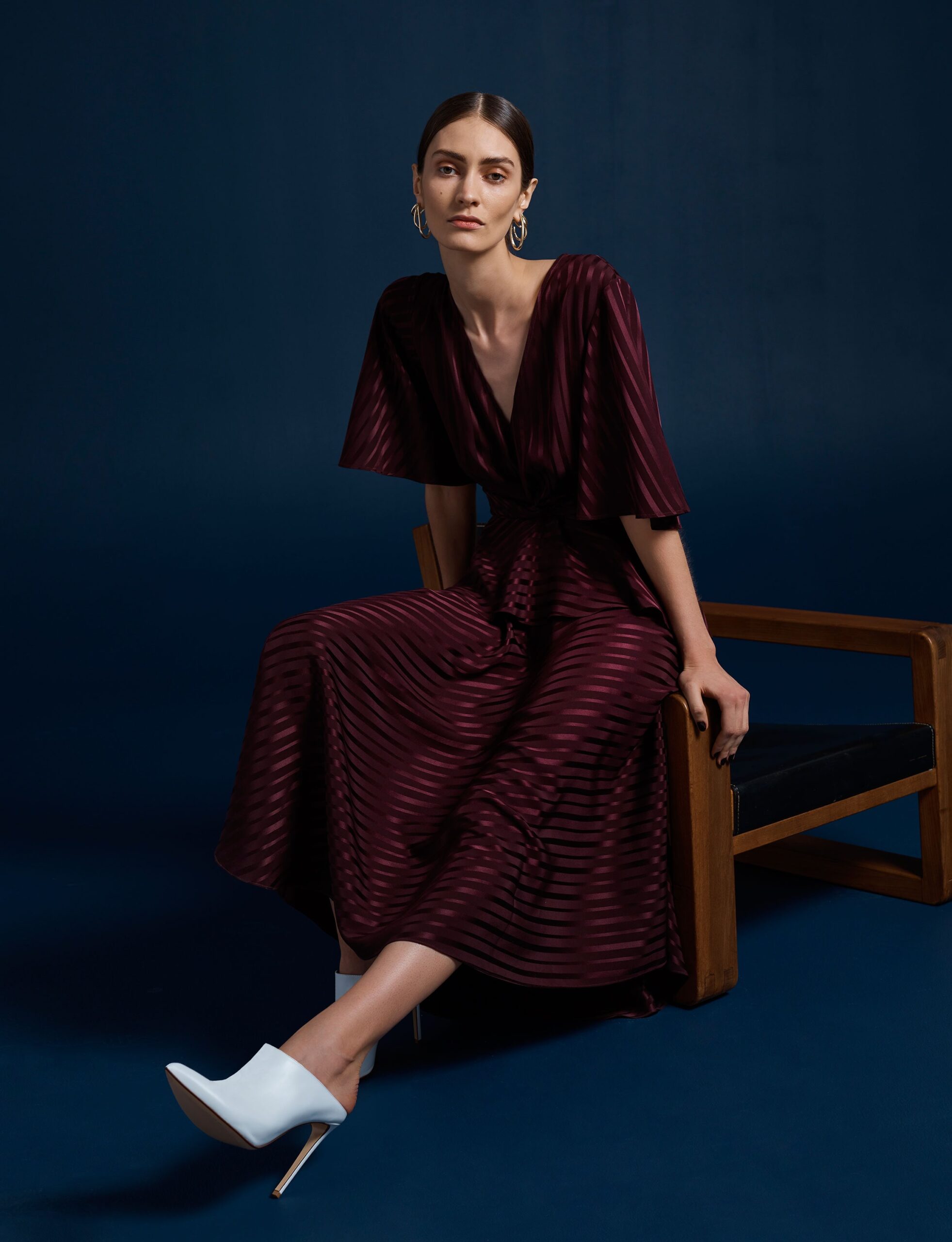 maroon silk short-sleeve v-neck fitted pleated midi dress