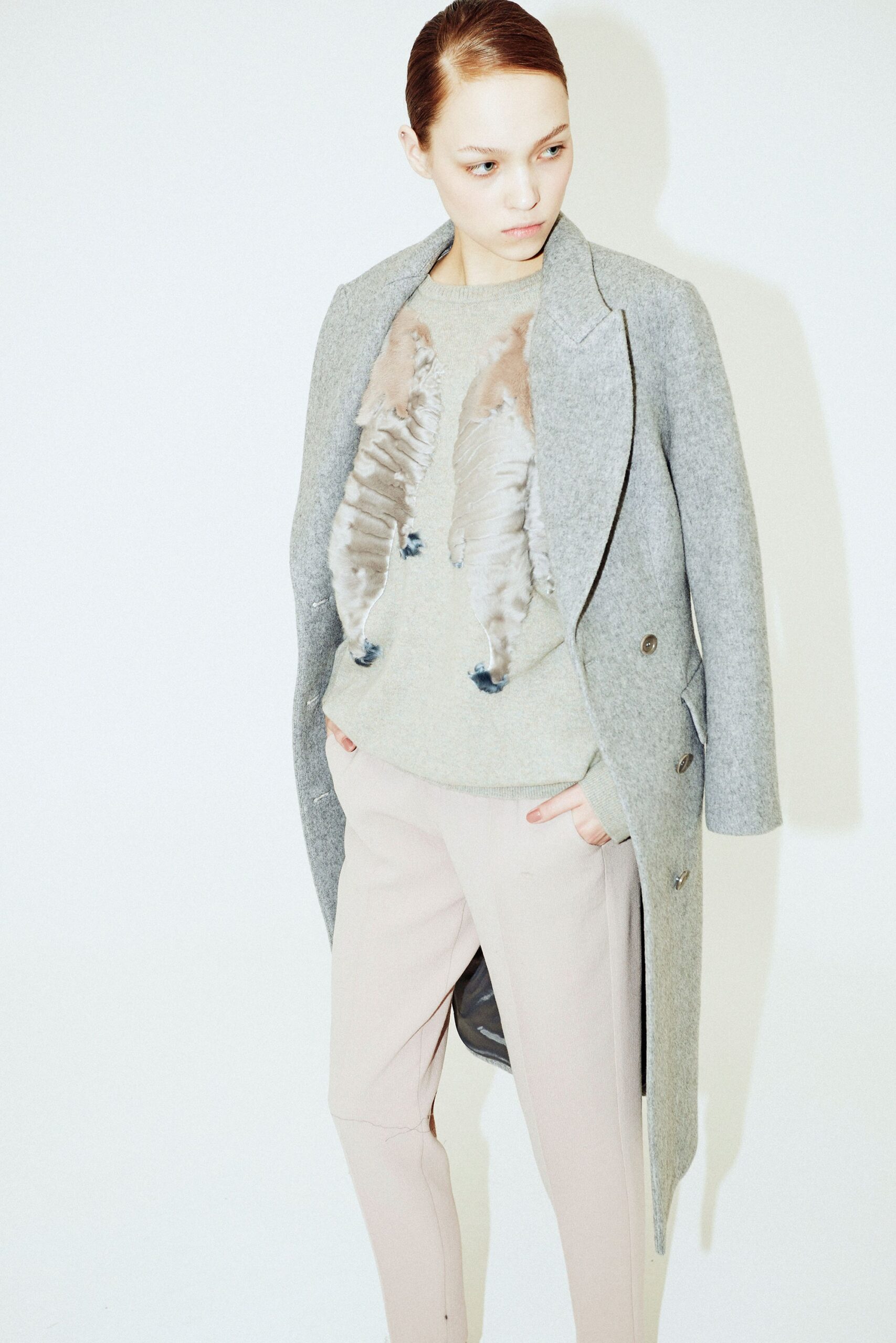 gray wool tailored coat with beige sweater