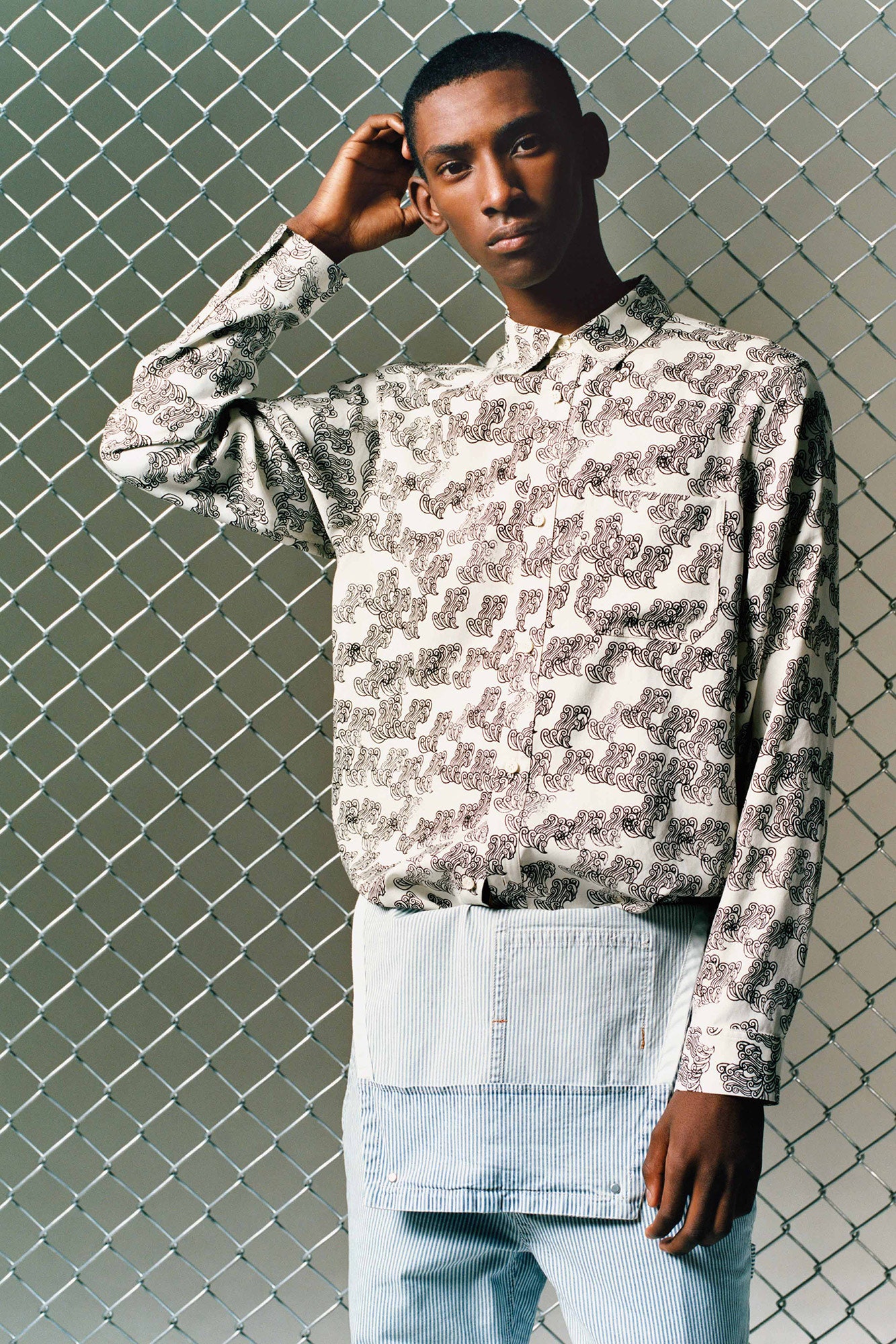 printed shirt and striped pants