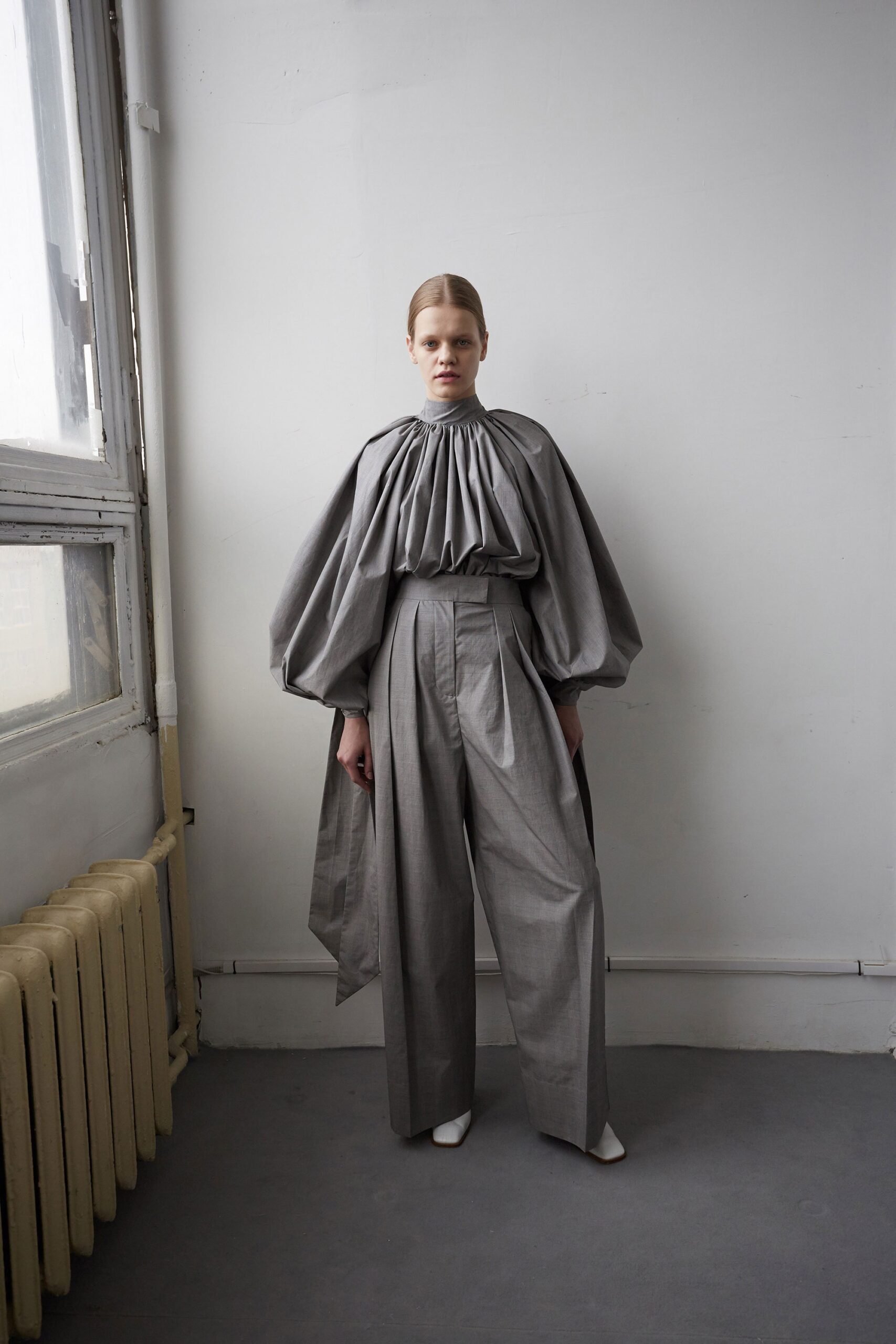 gray cotton long-sleeve high-neck relaxed pleated top