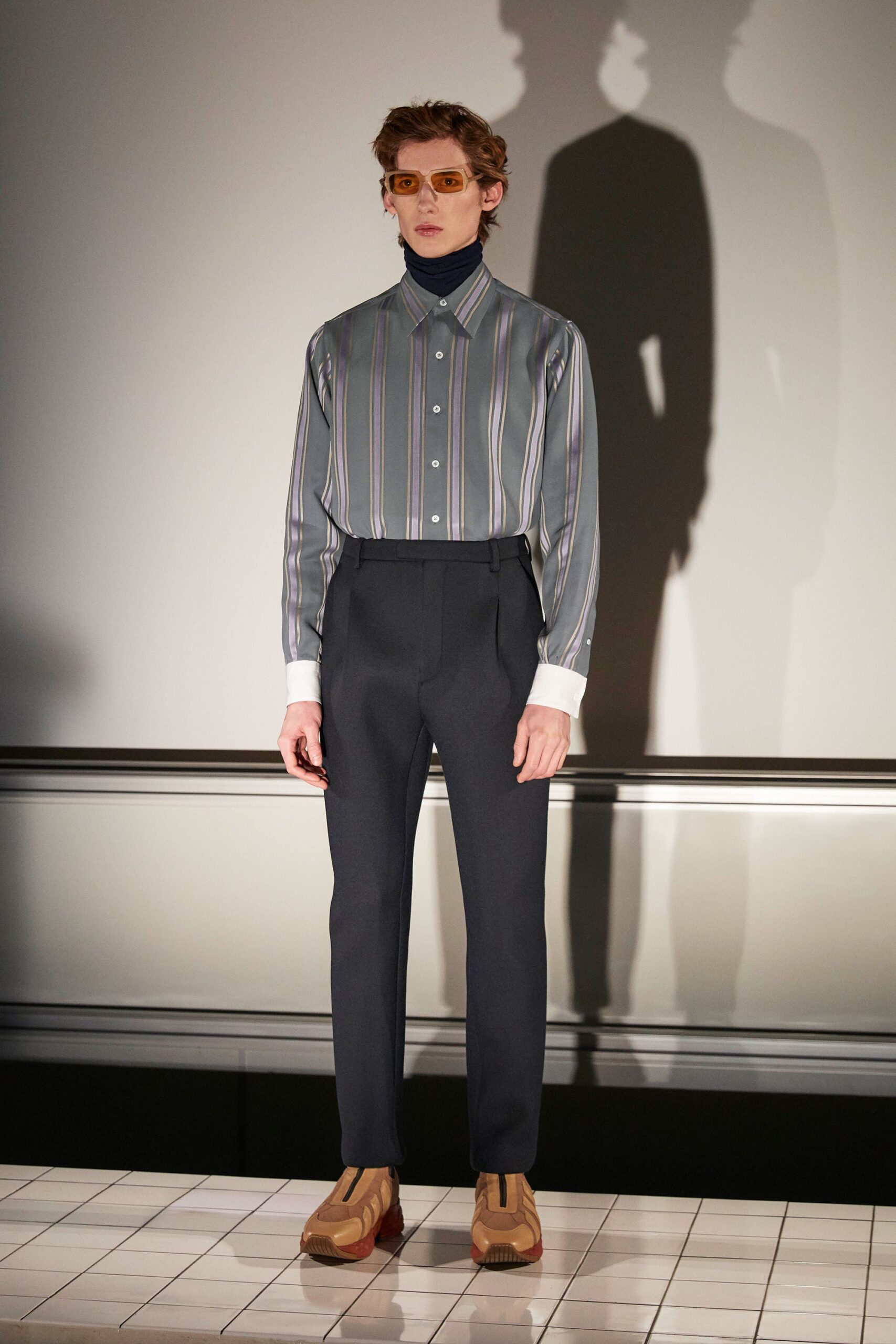 relaxed striped shirt and tailored pants