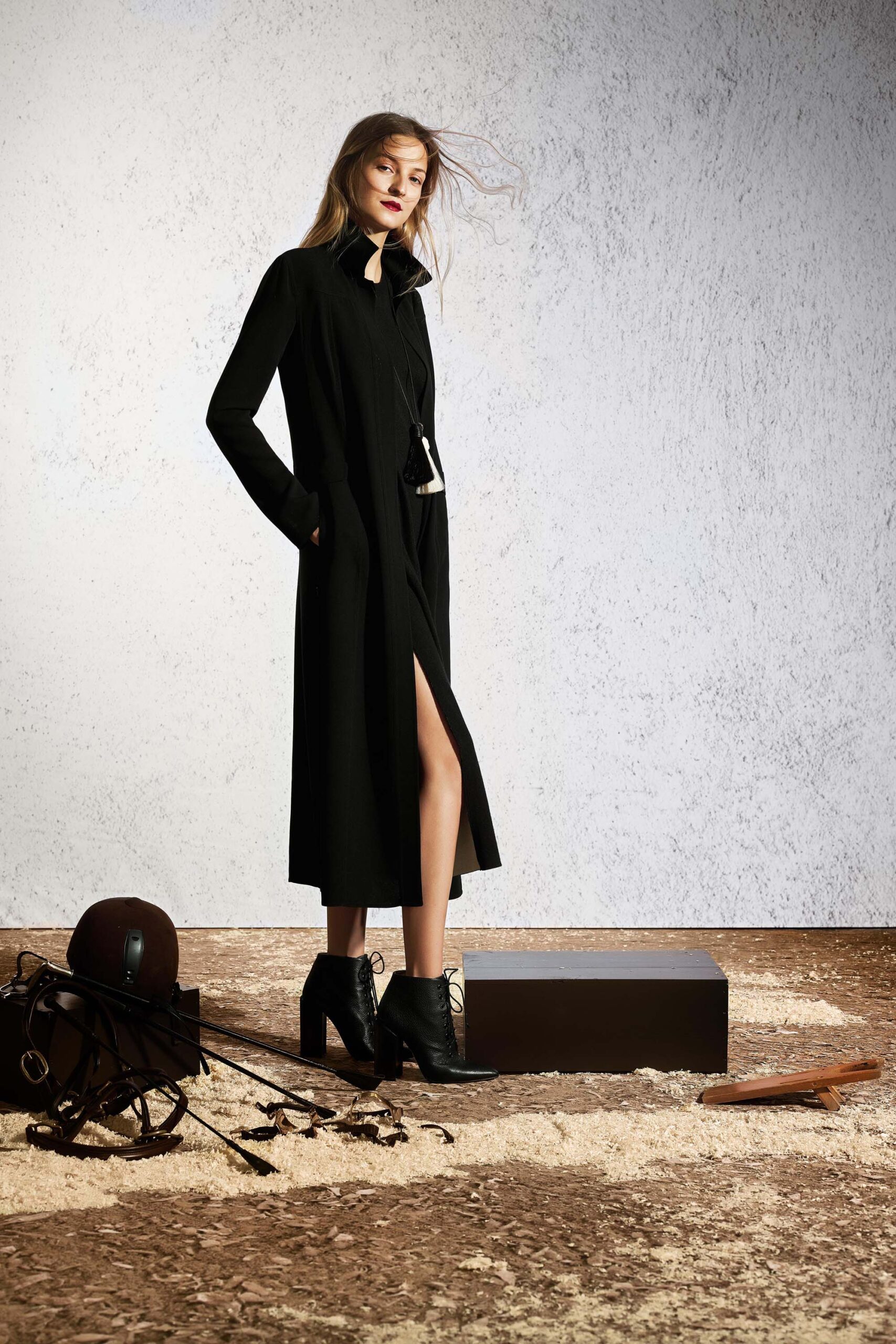 black wool midi coat and boots