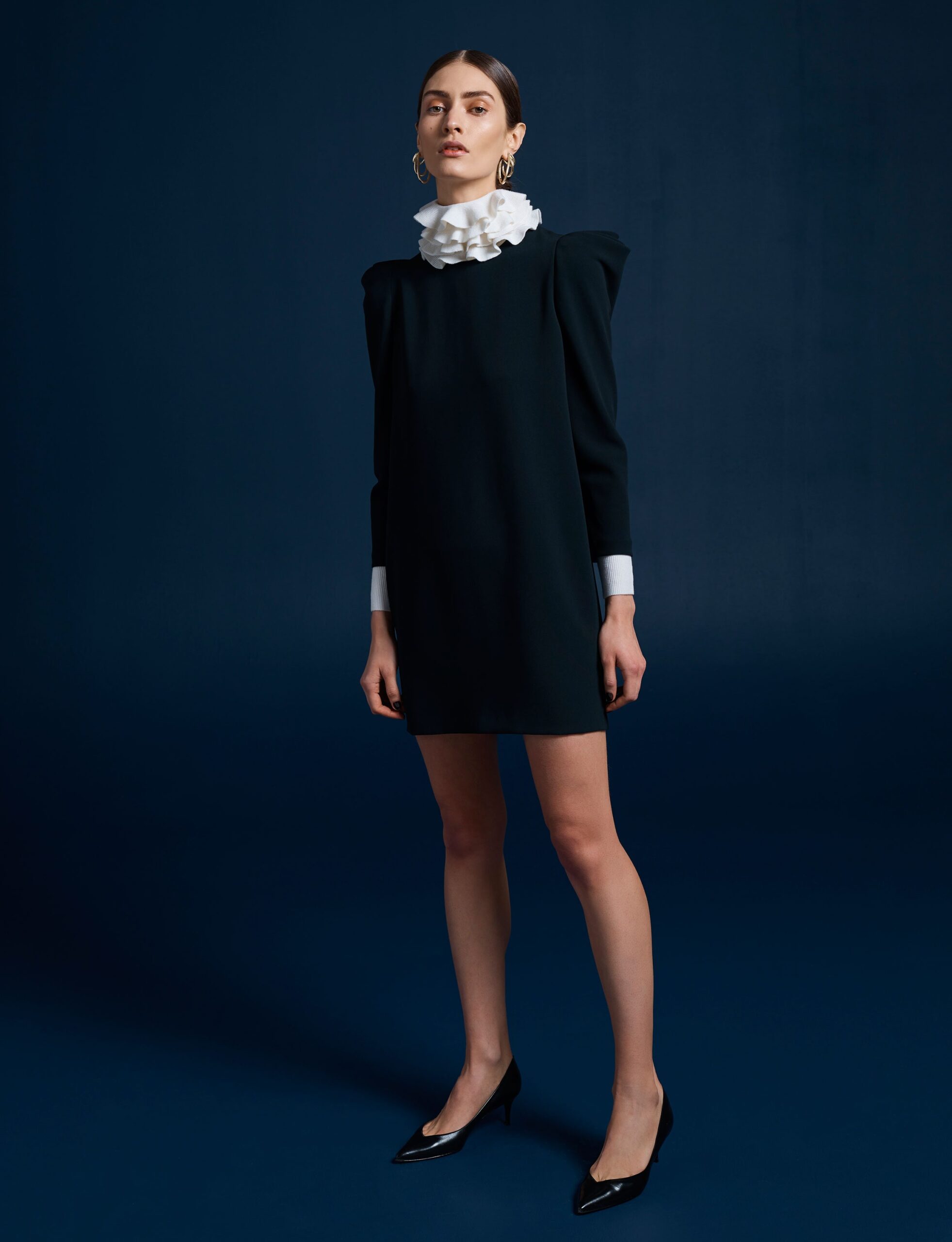 black fitted dress with ruffled collar