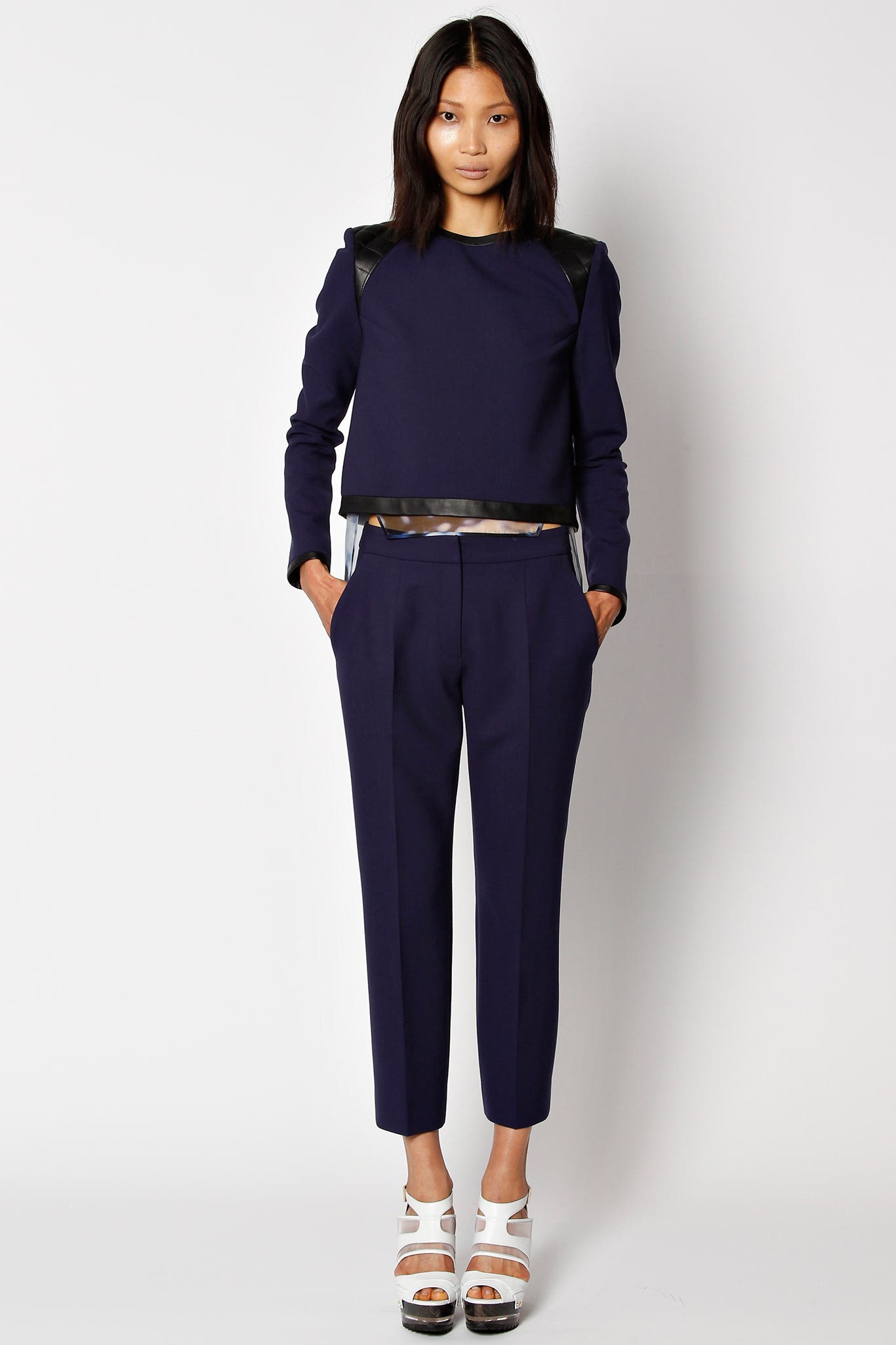 blue fitted top and tailored pants
