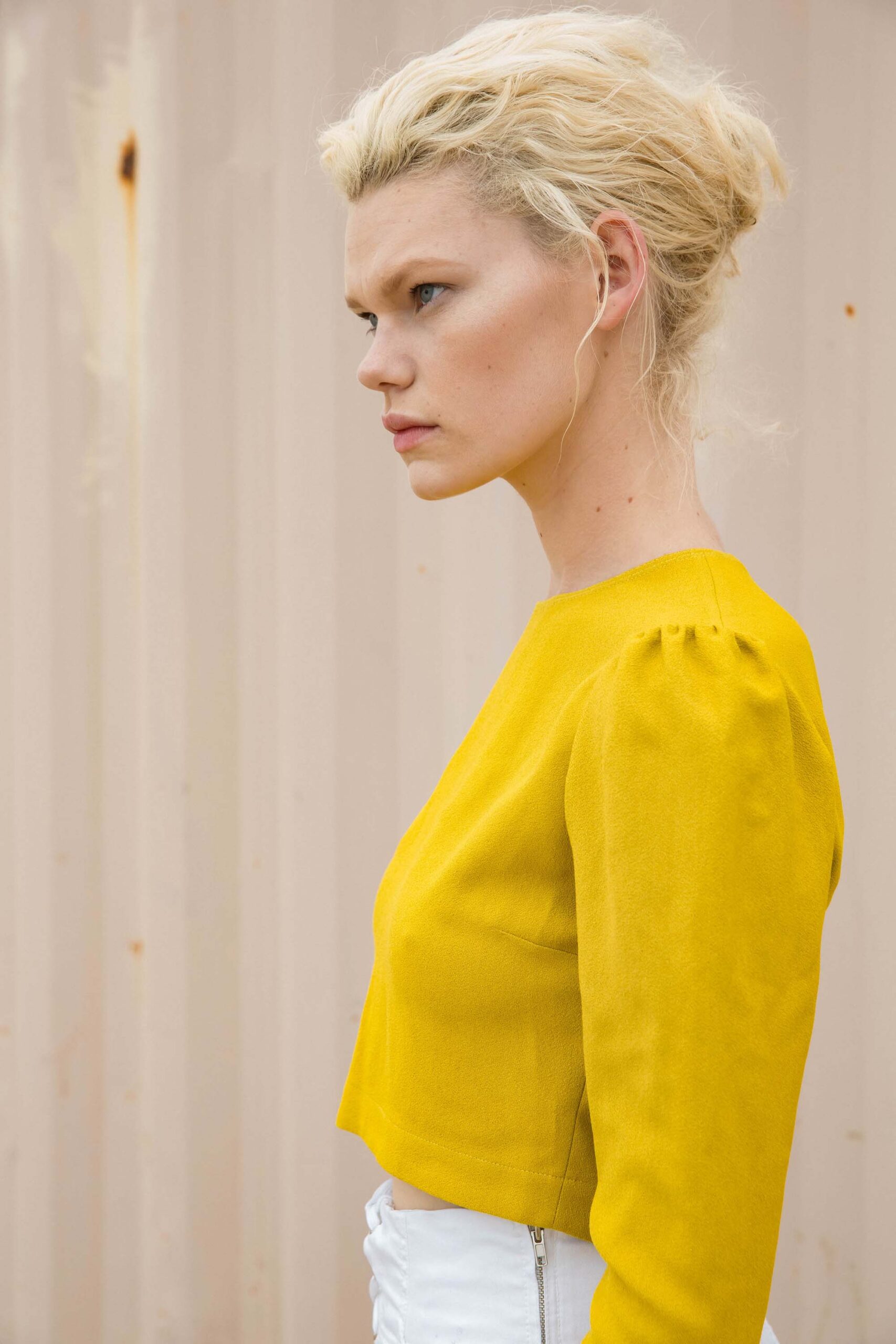 yellow cotton long-sleeve collared fitted pleated cropped top