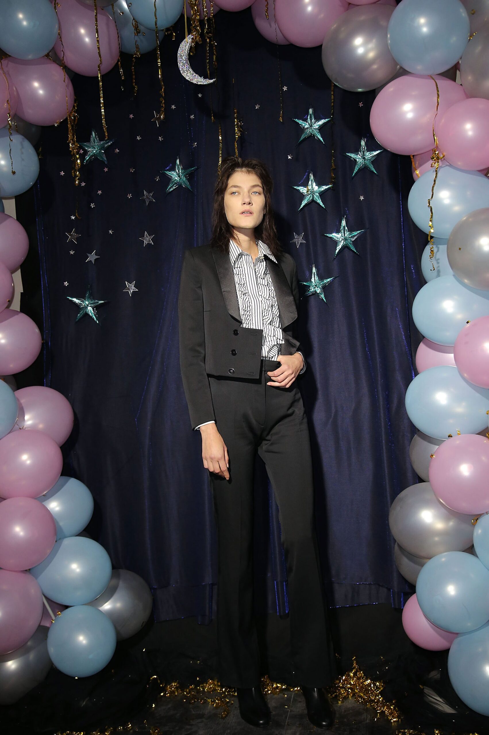 black wool long-sleeve collared tailored buttoned flared suit