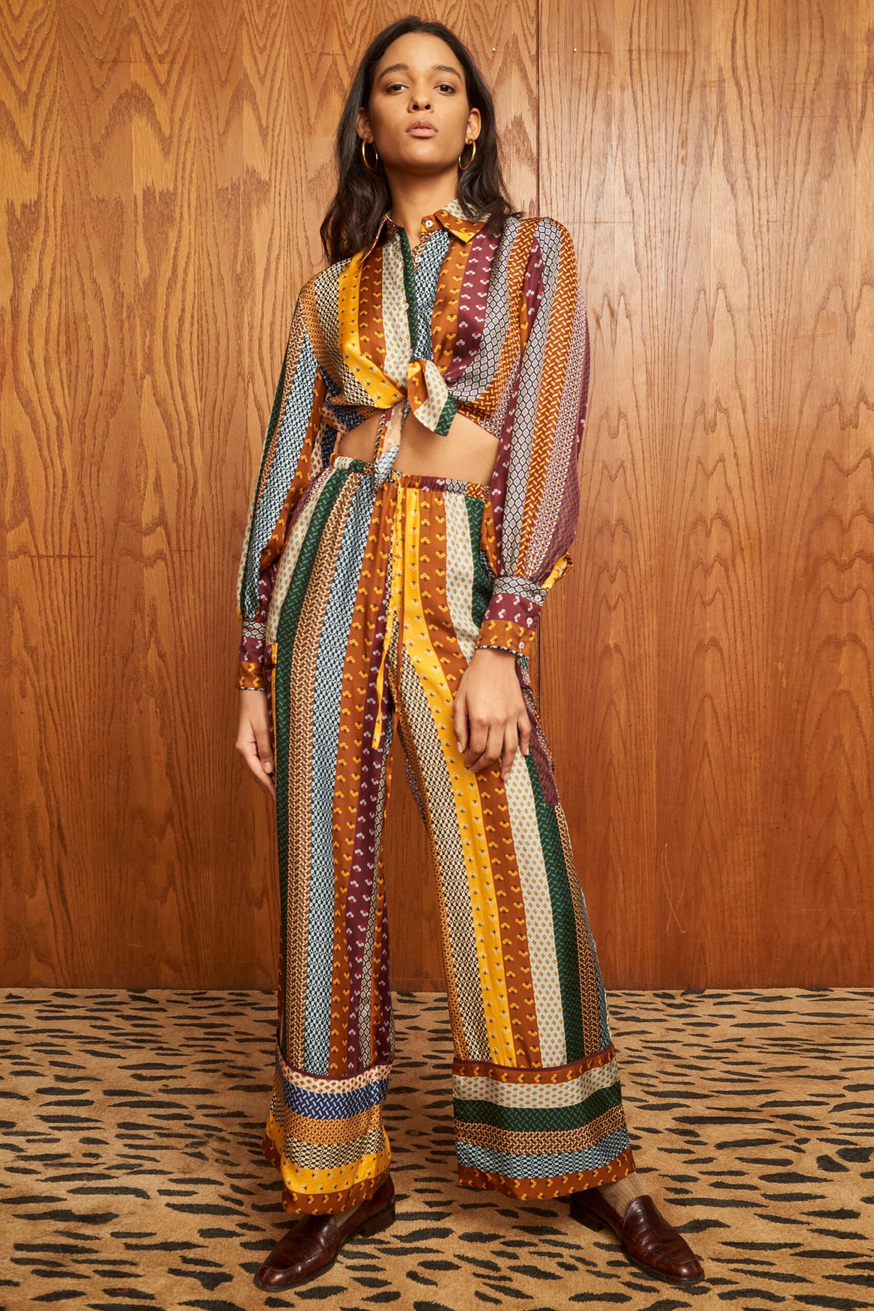 A relaxed multicolor striped top with long sleeves and matching pants.